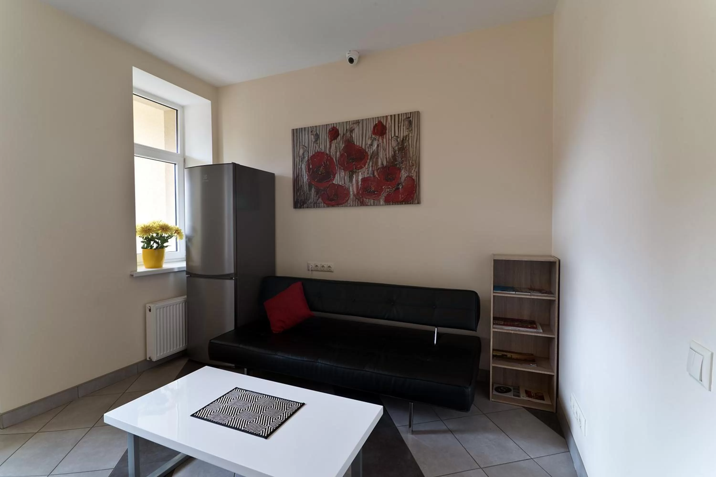 Communal lounge/ TV room in Happy Hotel