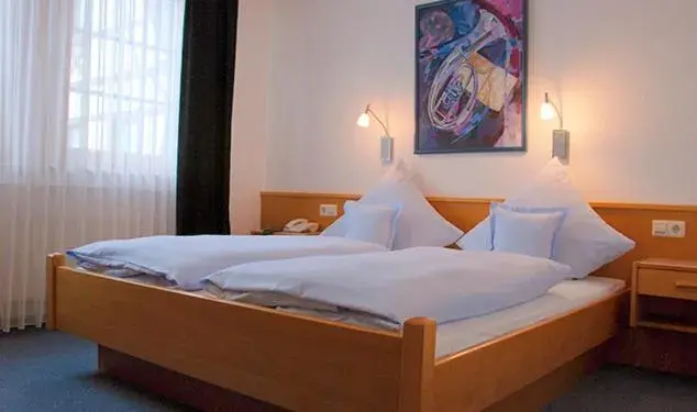 Photo of the whole room, Bed in Hotel Gülser Weinstube