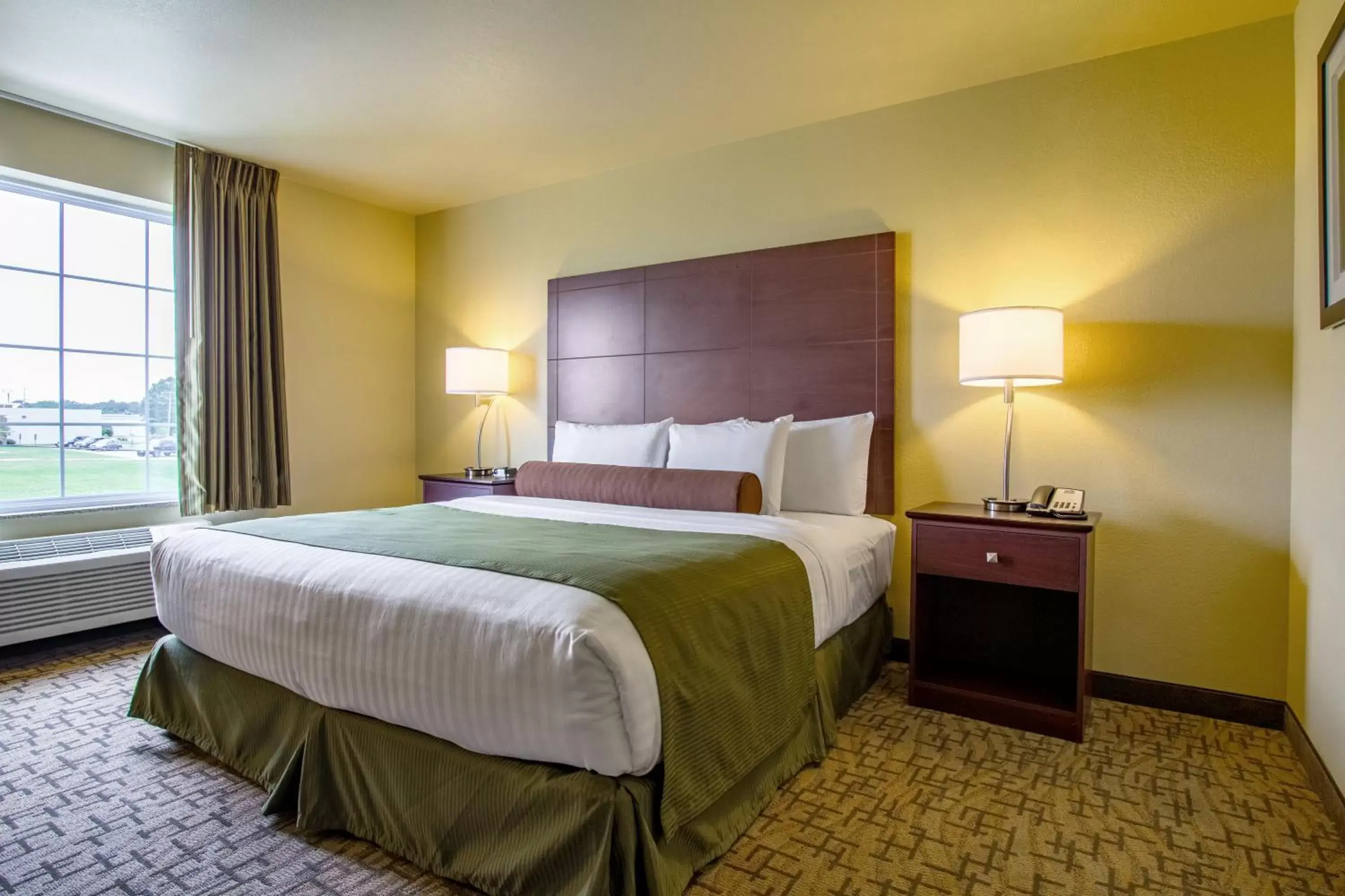 Bed in Cobblestone Hotel & Suites - Orrville