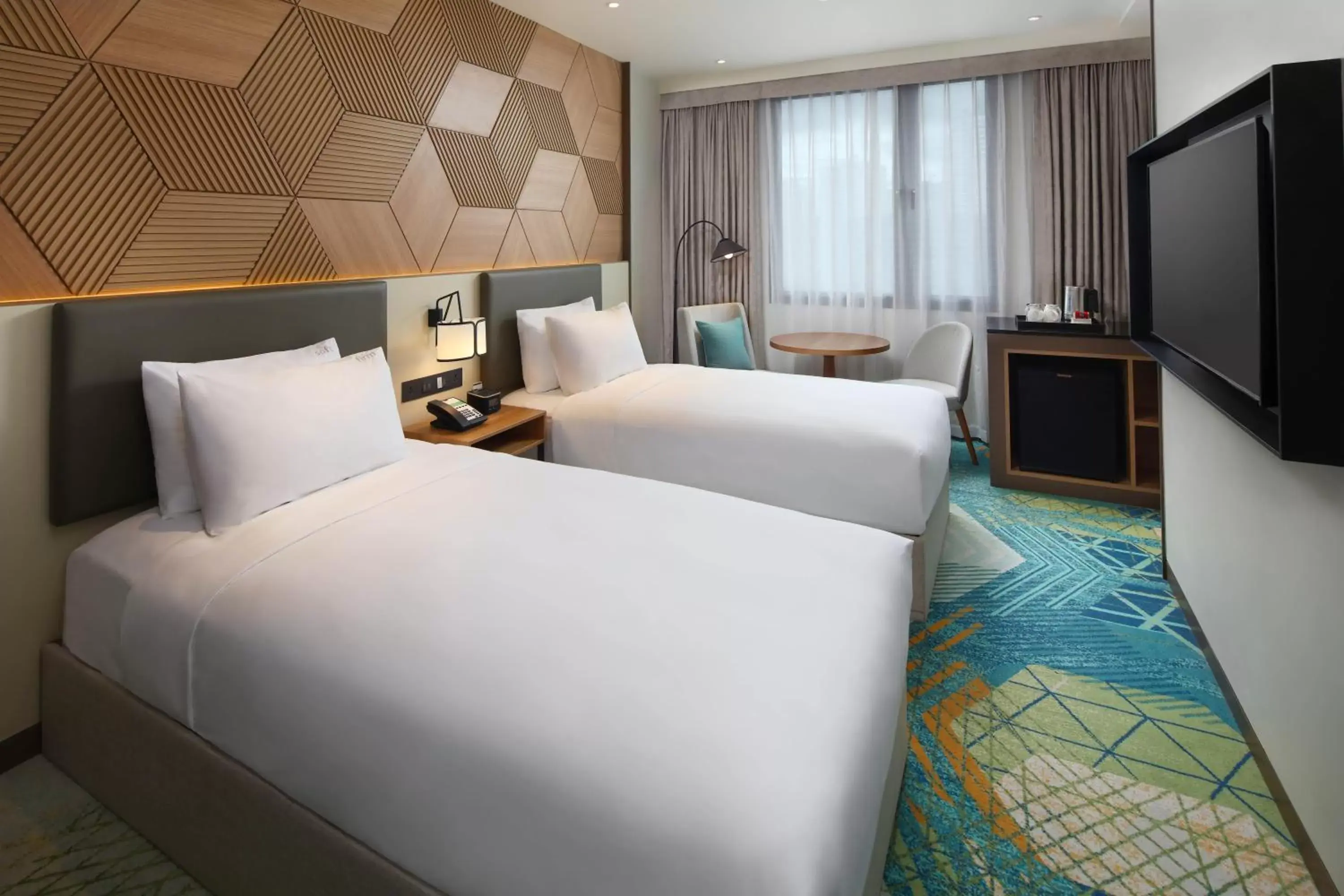 Bed in Holiday Inn Cebu City, an IHG Hotel