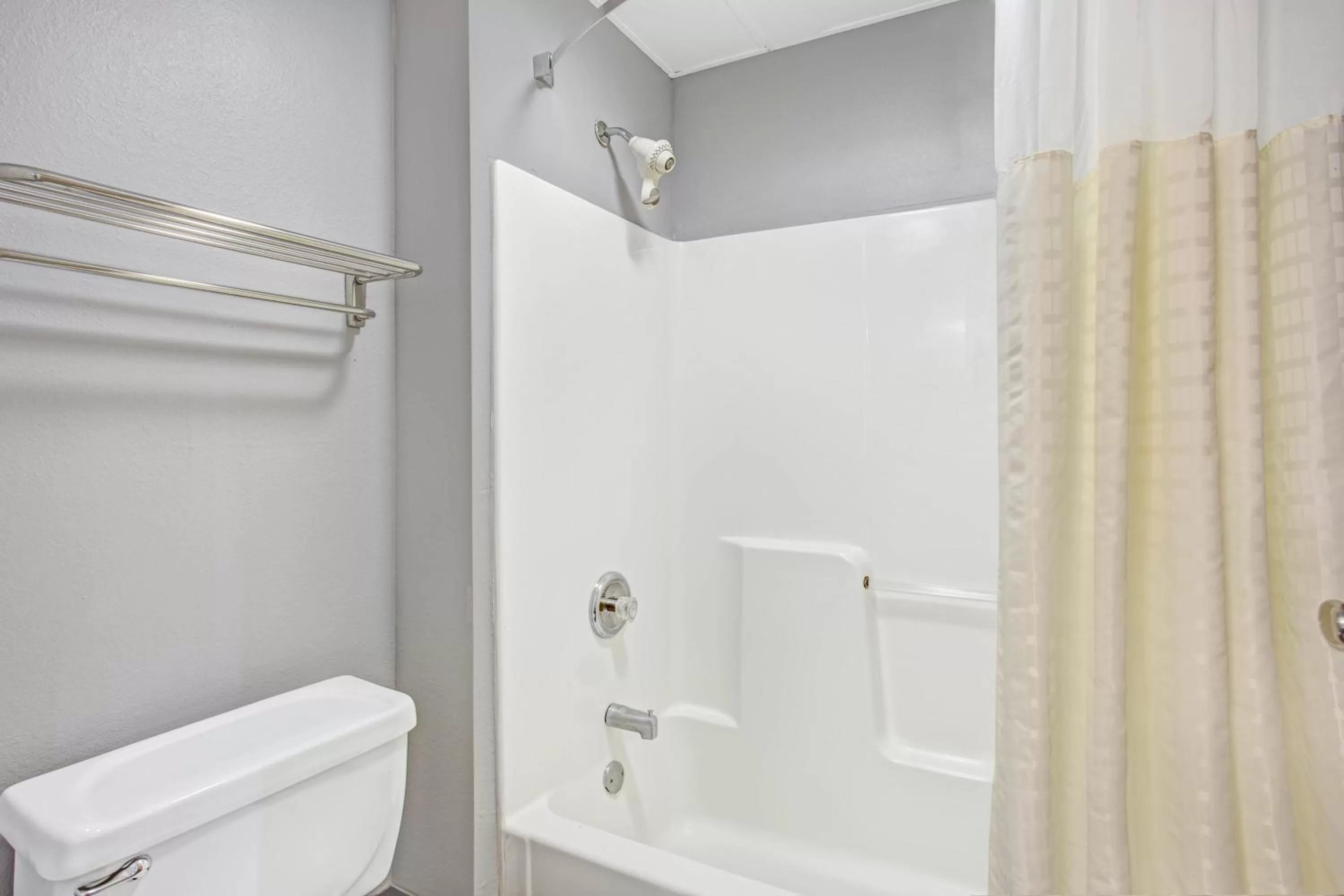 Toilet in Days Inn by Wyndham Great Lakes Naval Base