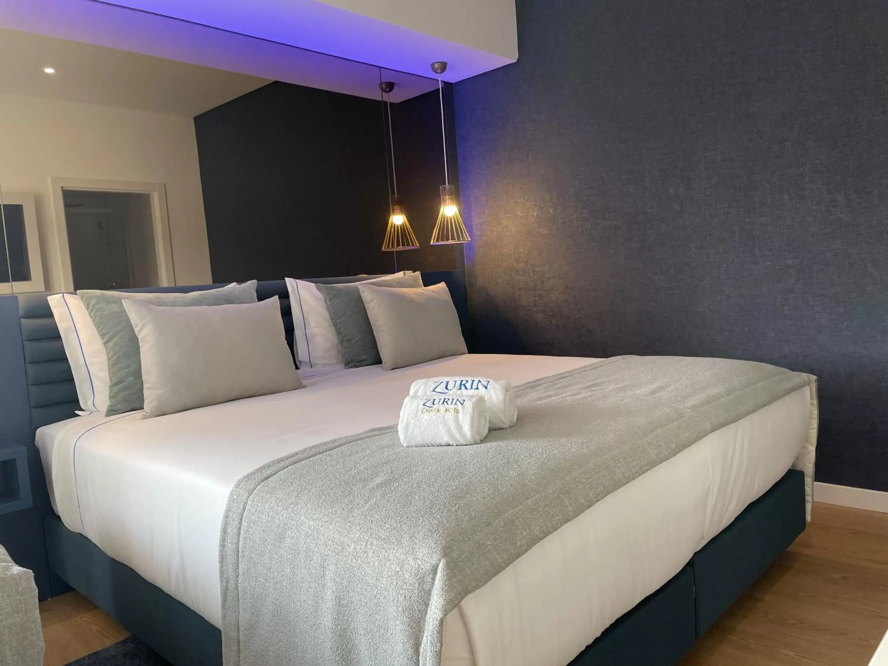 Bed in Zurin Charm Hotel