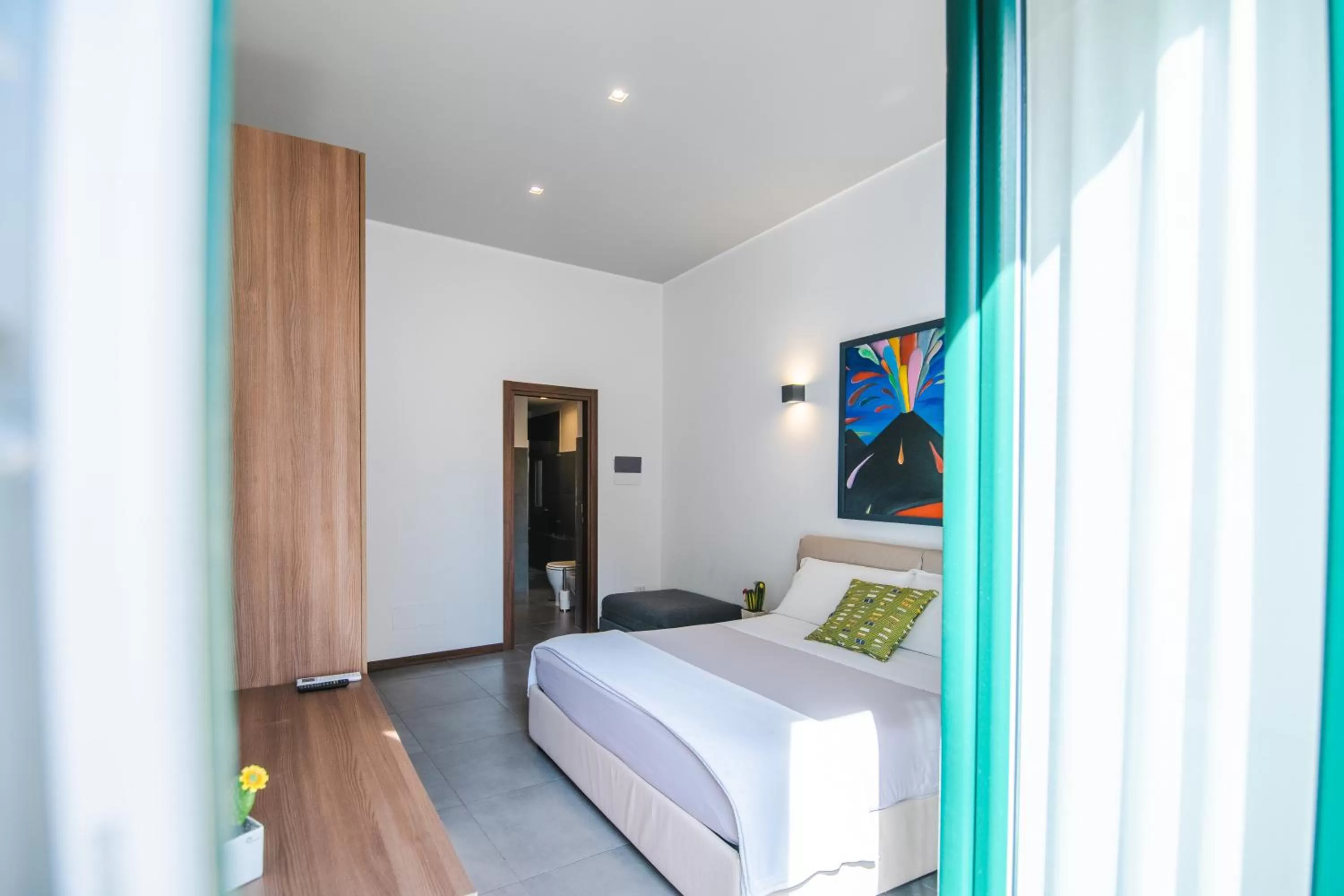 Photo of the whole room, Bed in Arco Dei Pinto