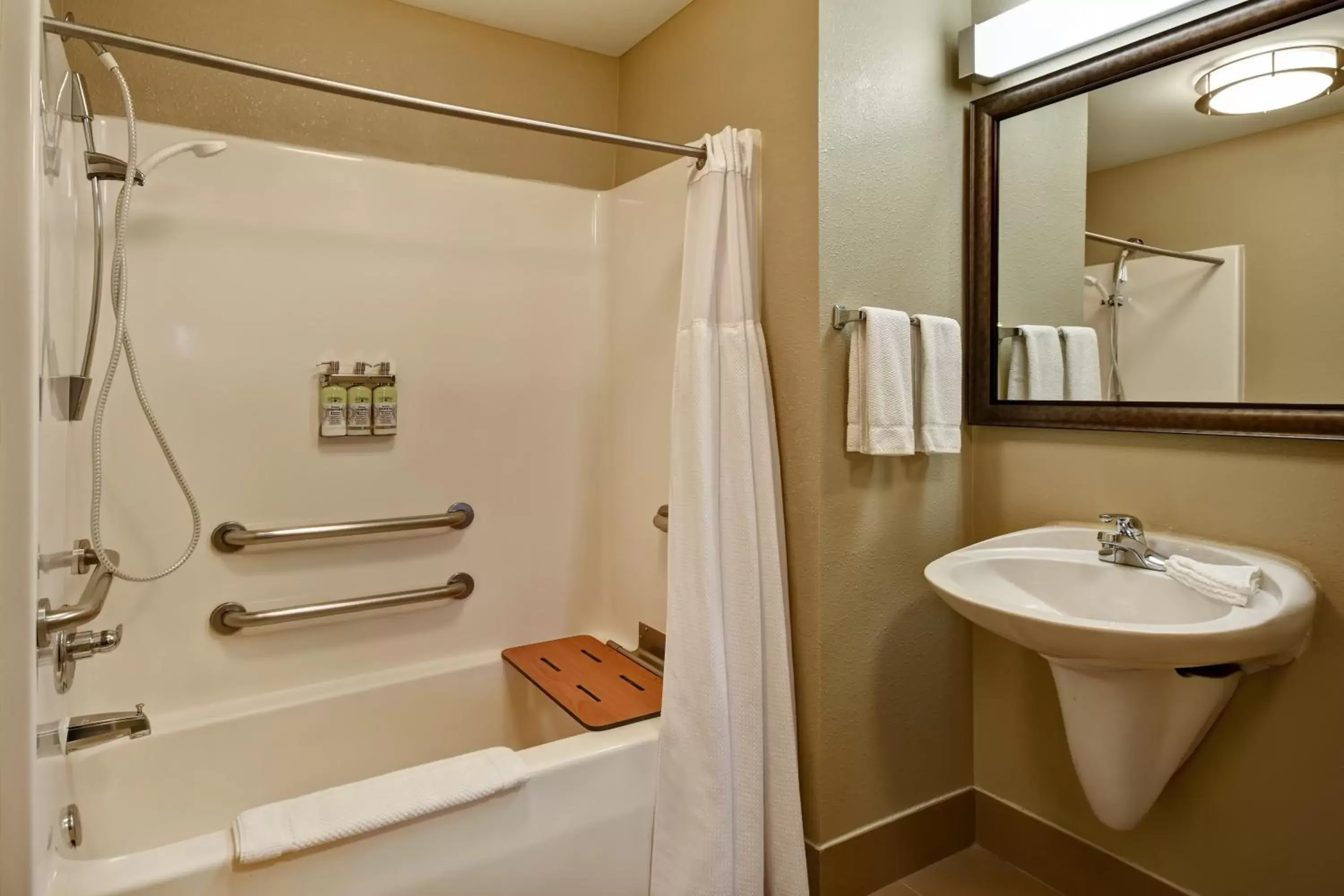 Bedroom, Bathroom in Staybridge Suites Grand Rapids-Kentwood, an IHG Hotel