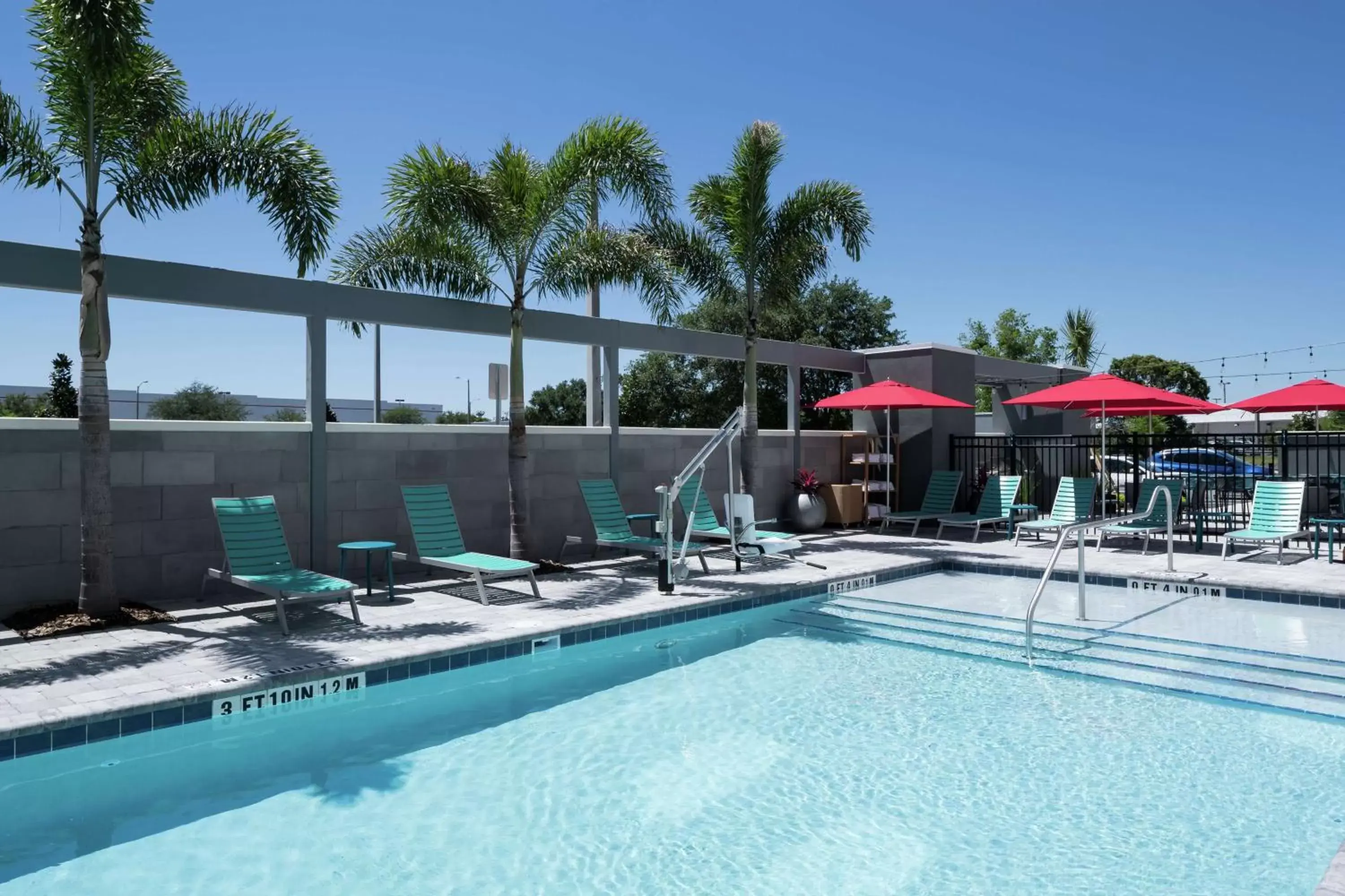 Patio, Swimming Pool in Home2 Suites By Hilton Orlando Airport
