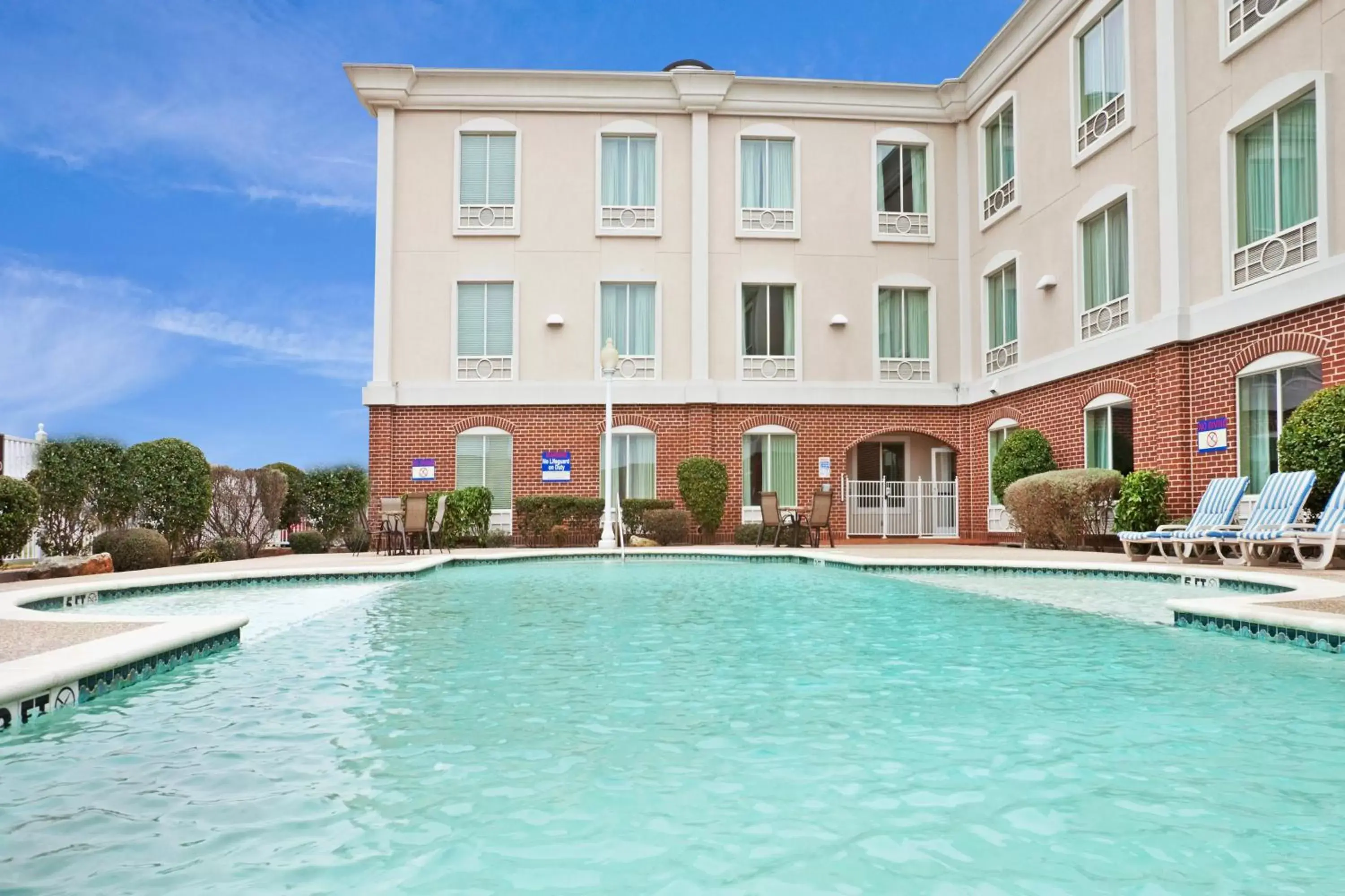 Swimming pool, Property Building in Holiday Inn Express Hotel & Suites Waxahachie, an IHG Hotel