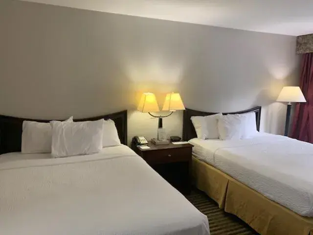 Bed in Days Inn by Wyndham Ocean Springs Bed in Days Inn by Wyndham Ocean Springs