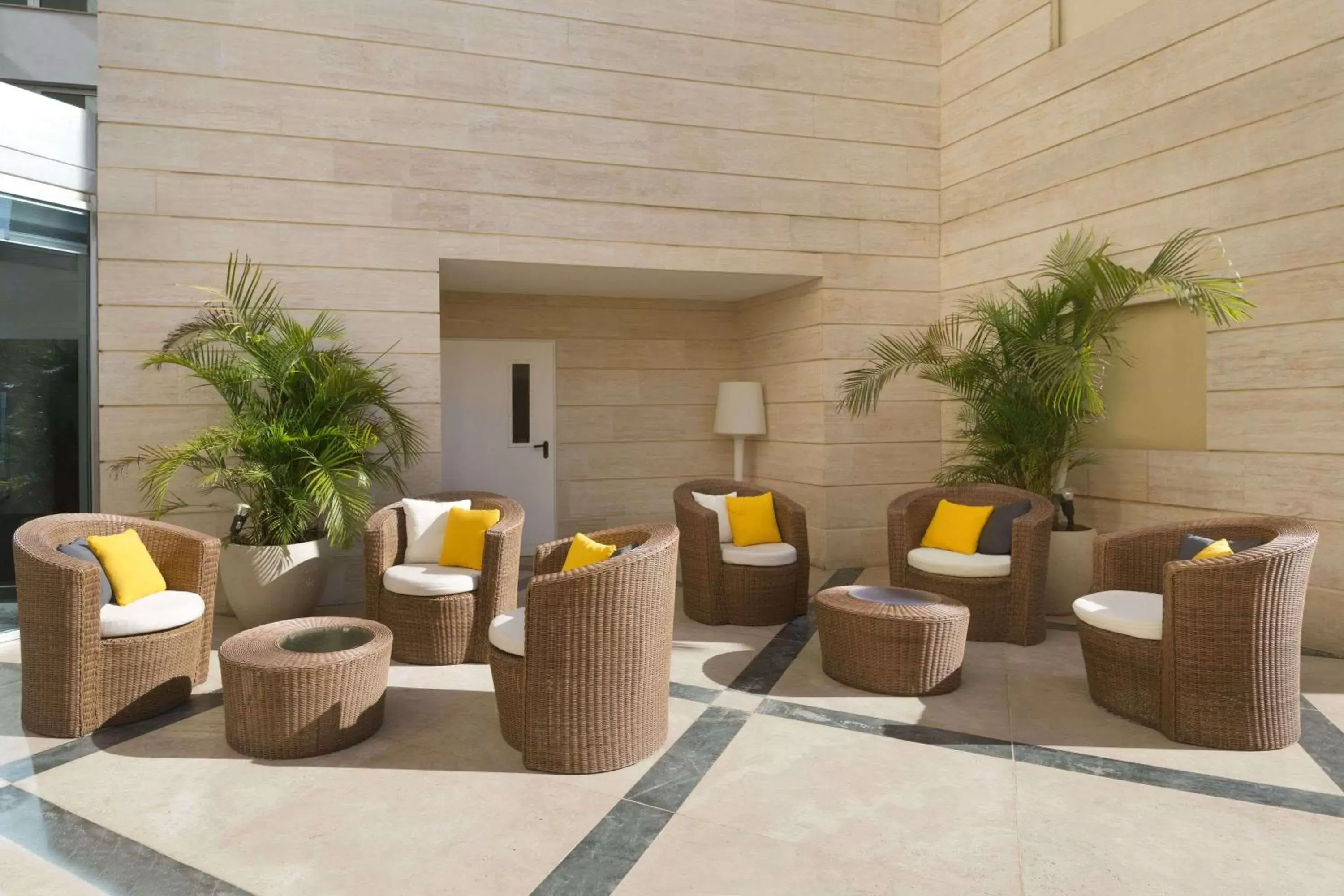Seating area in Ramada Hotel & Suites by Wyndham Netanya