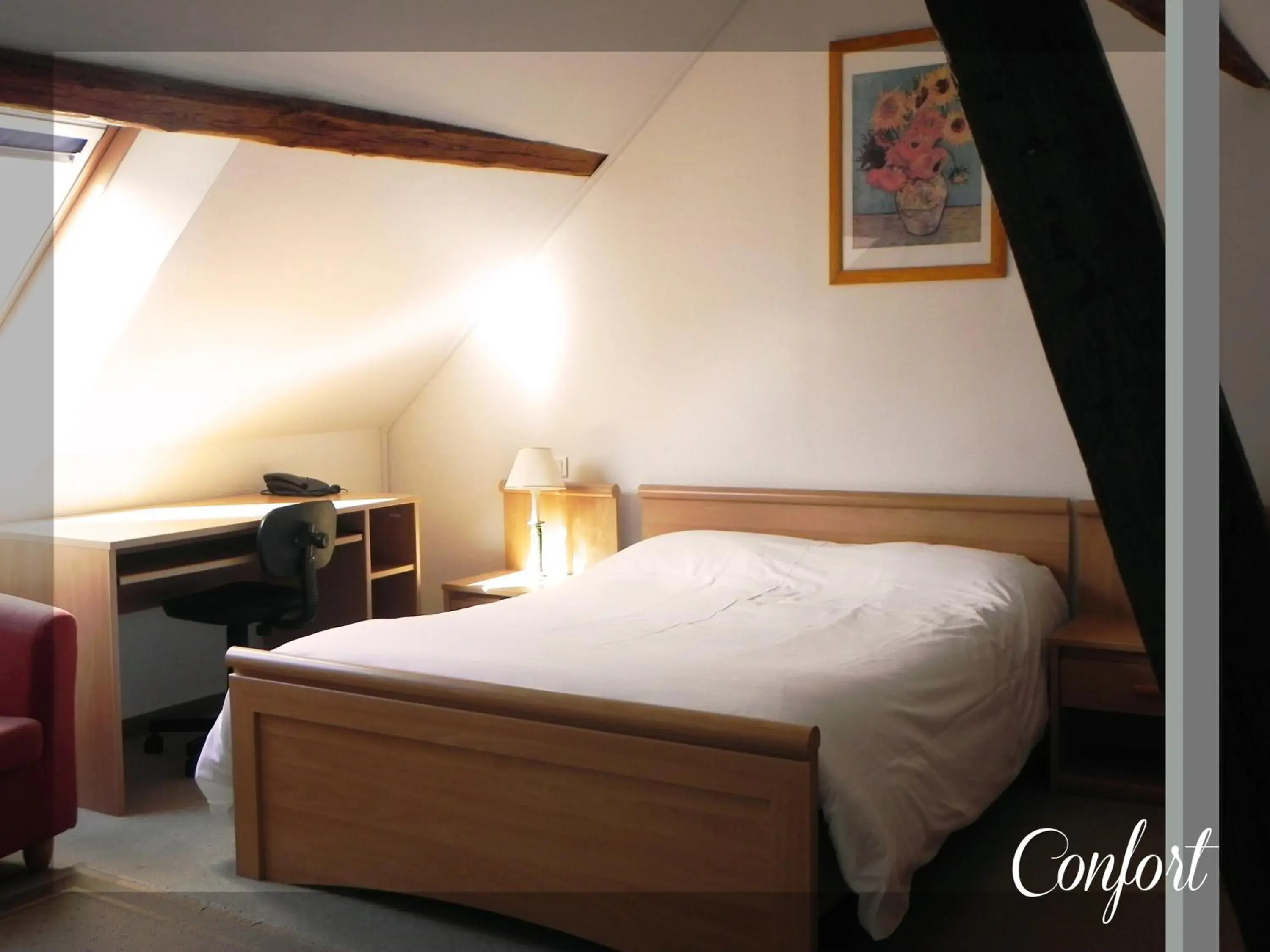 Bed in Le Relais Champenois Logis