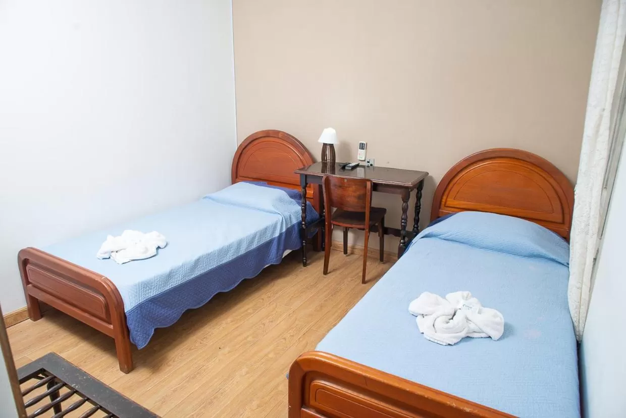 Bed in hotel py jaguarão