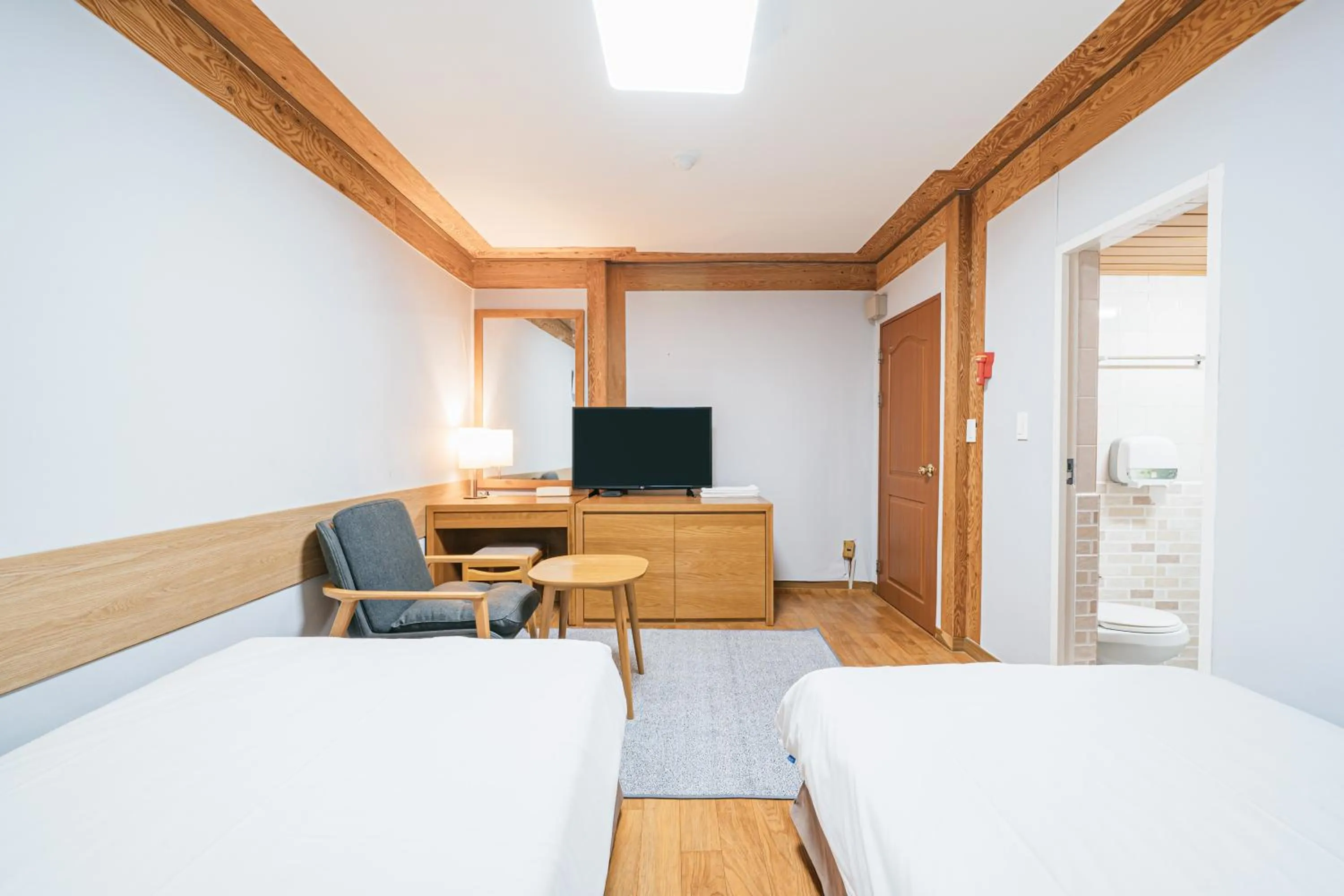 Bed in Jeju Miracle Hotel