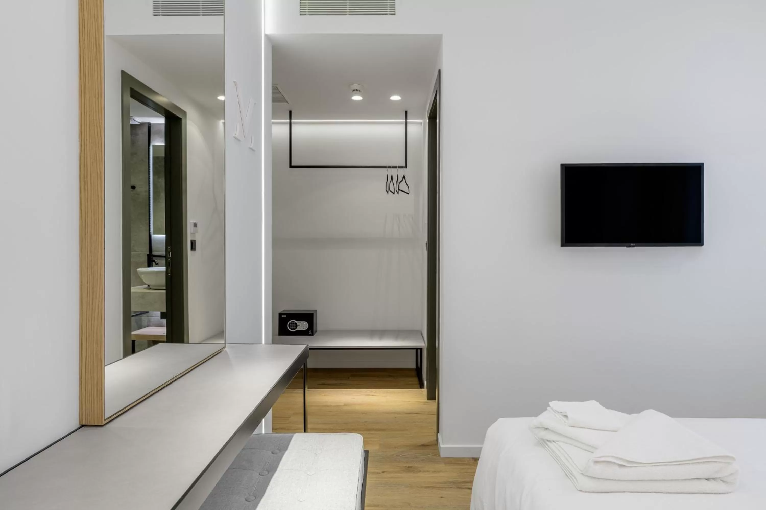 Bed in Acropolis Magenta Luxury Suites