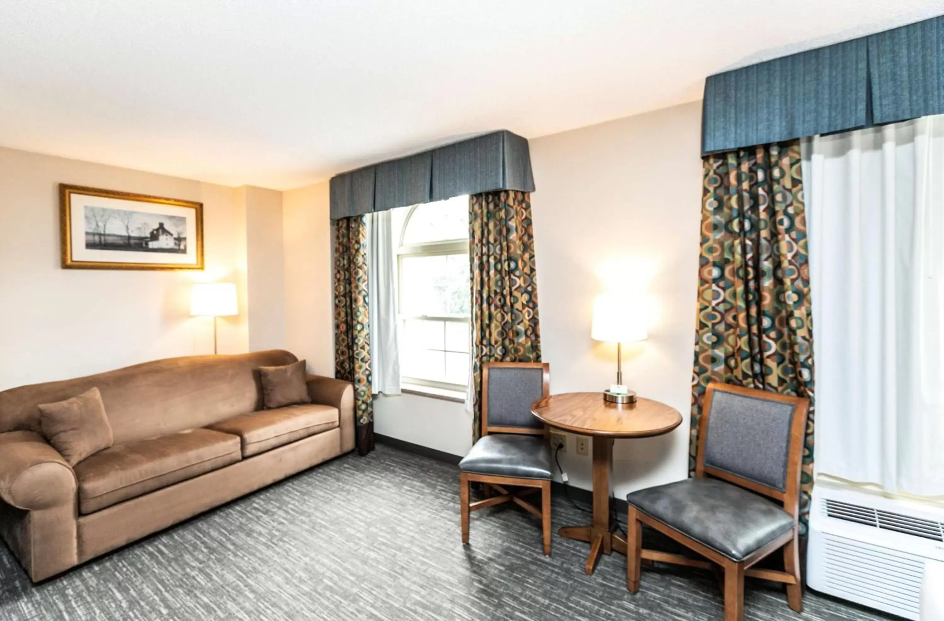 Photo of the whole room, Seating Area in SureStay Plus Hotel by Best Western Elizabethtown Hershey