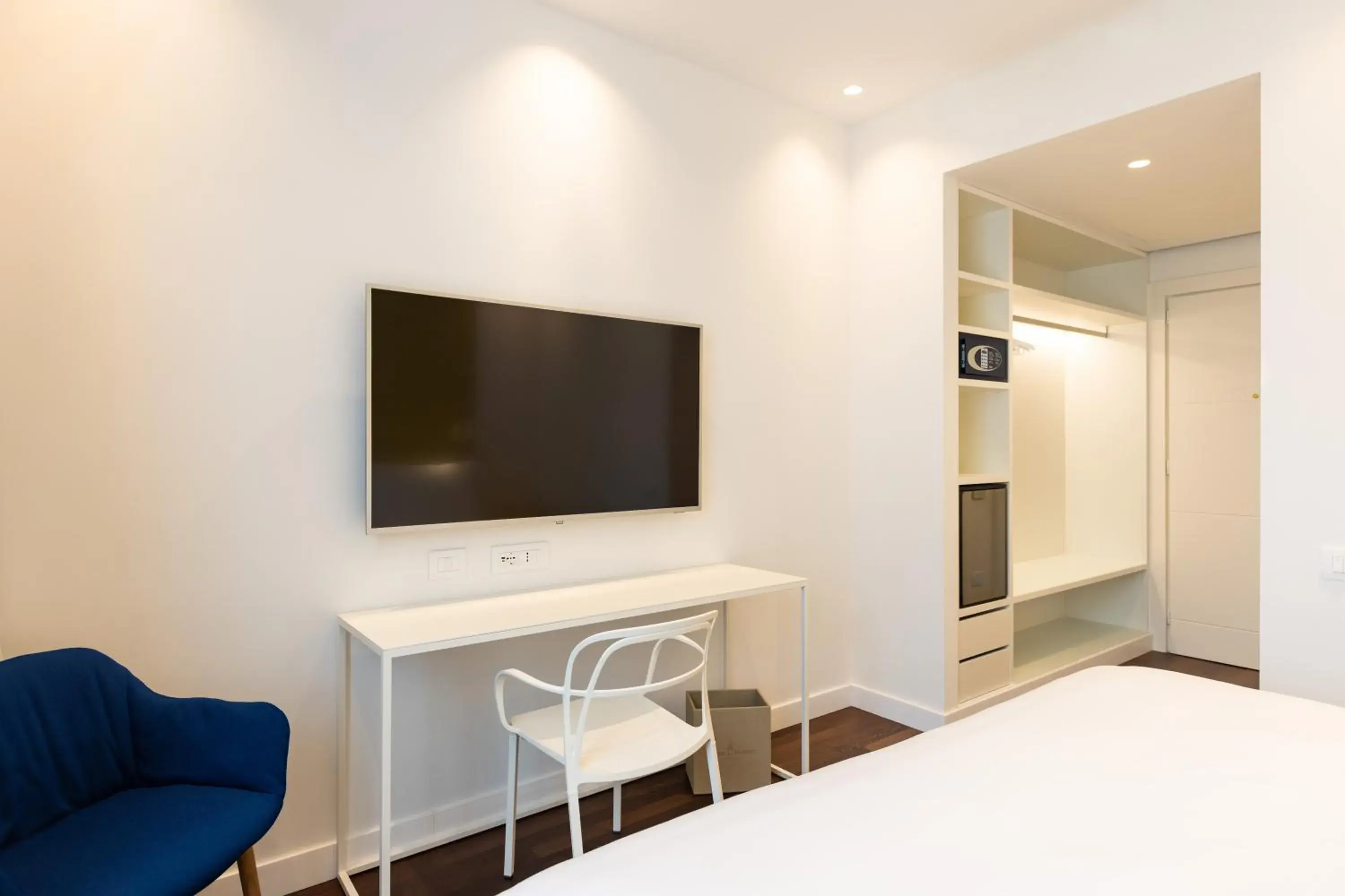Bedroom, TV/Entertainment Center in Hotel Morfeo