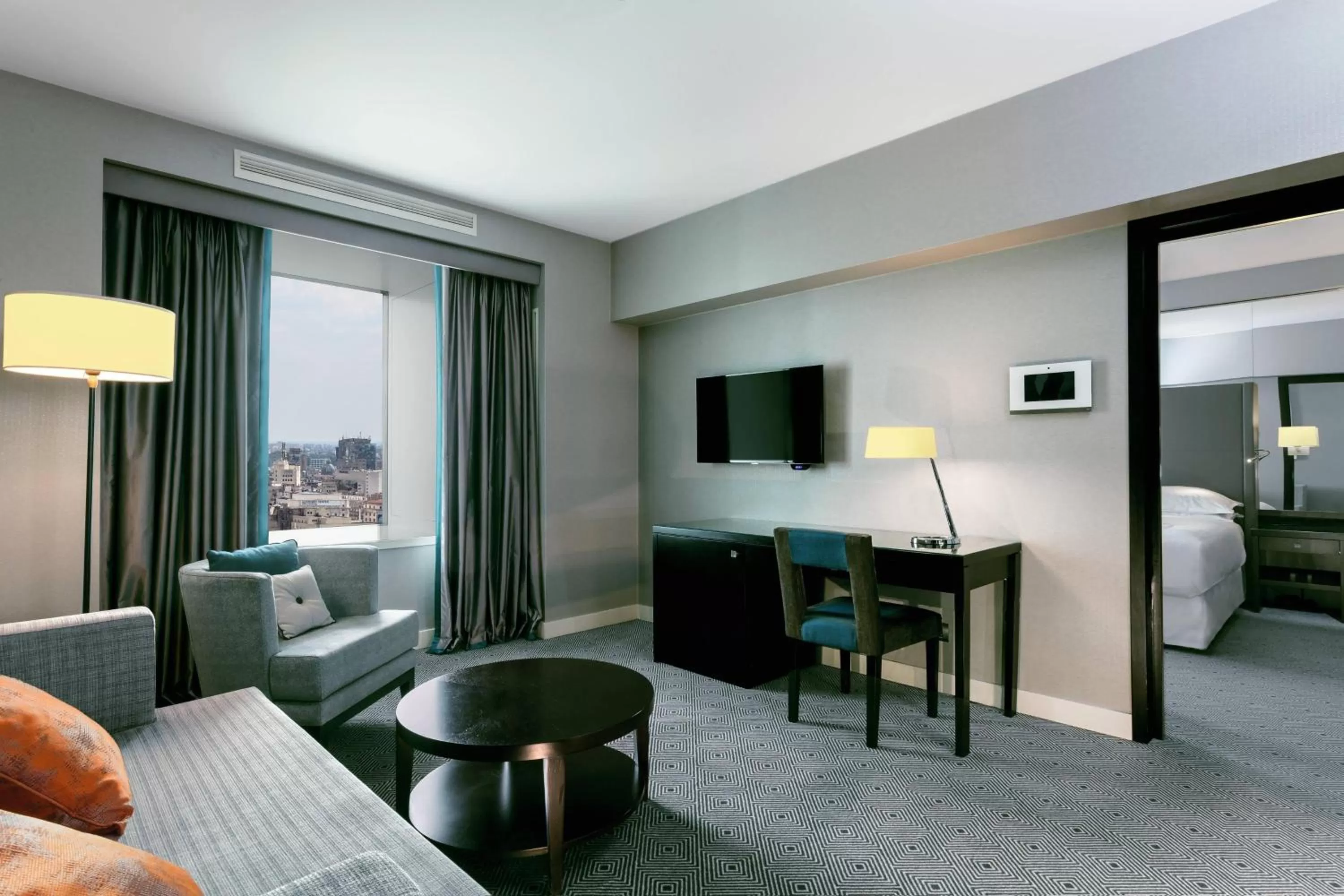 Living room, Bed in Sheraton Bucharest Hotel