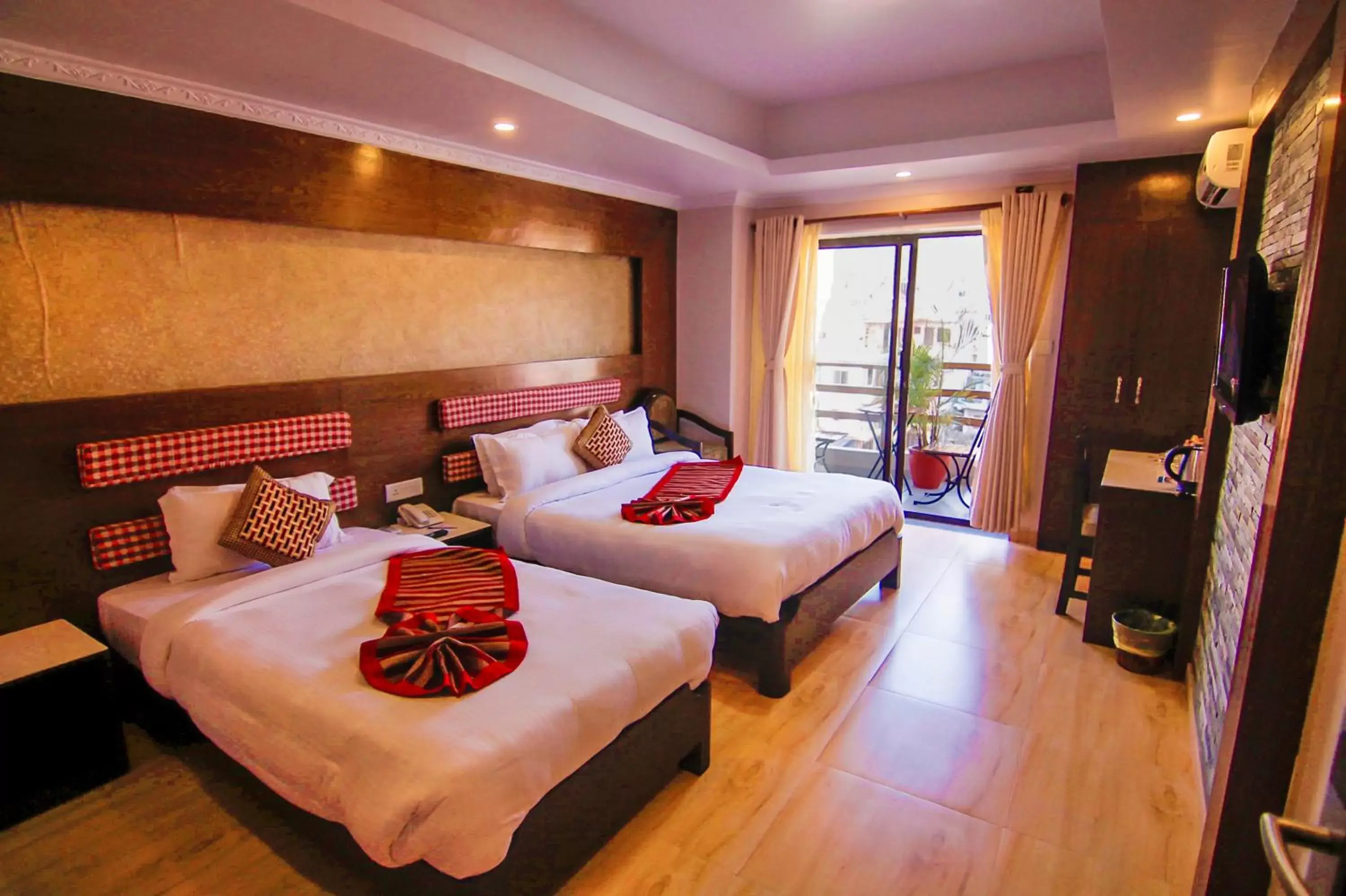 Bed in Kuti Resort & Spa