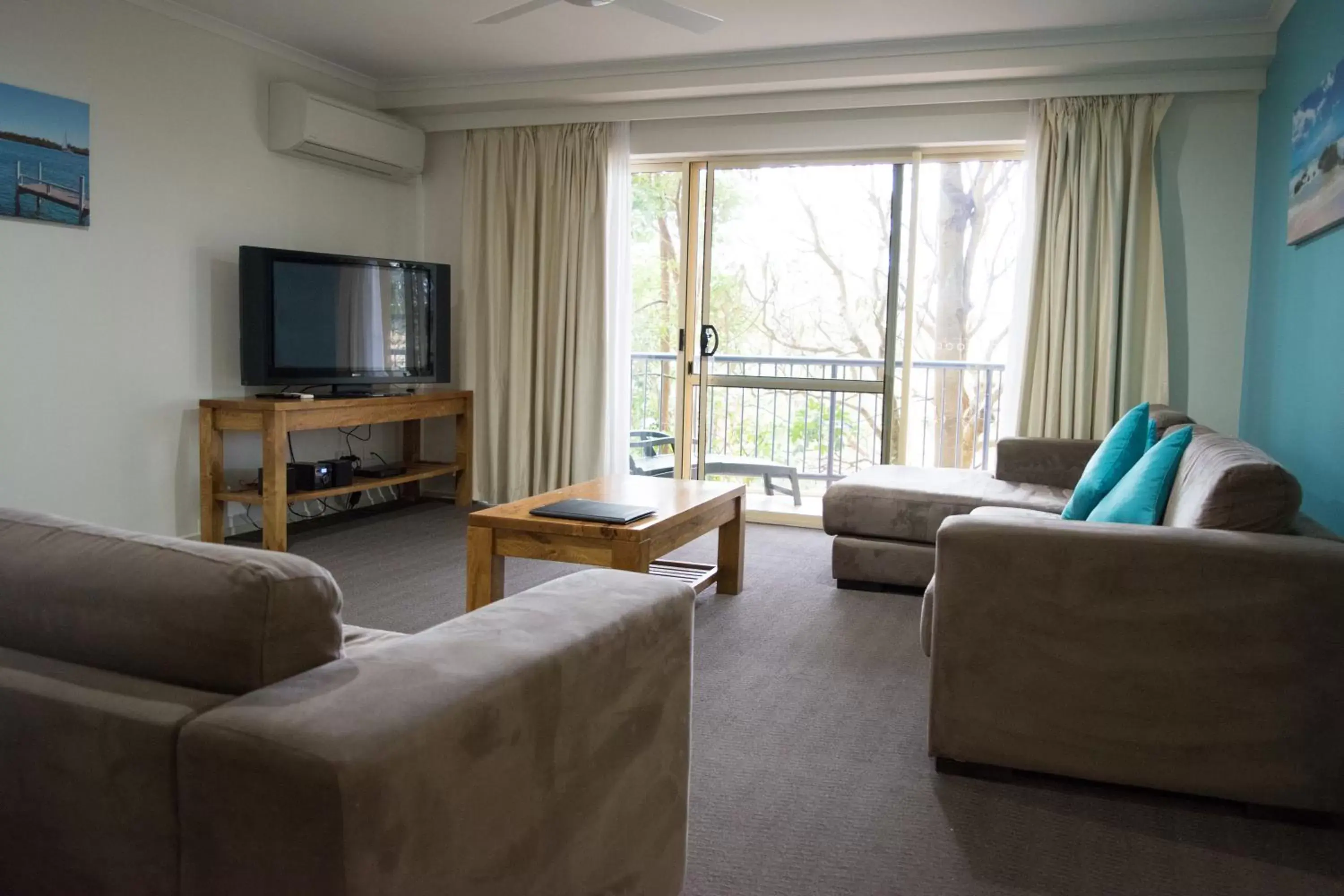 TV and multimedia, Seating Area in Beachside Holiday Apartments