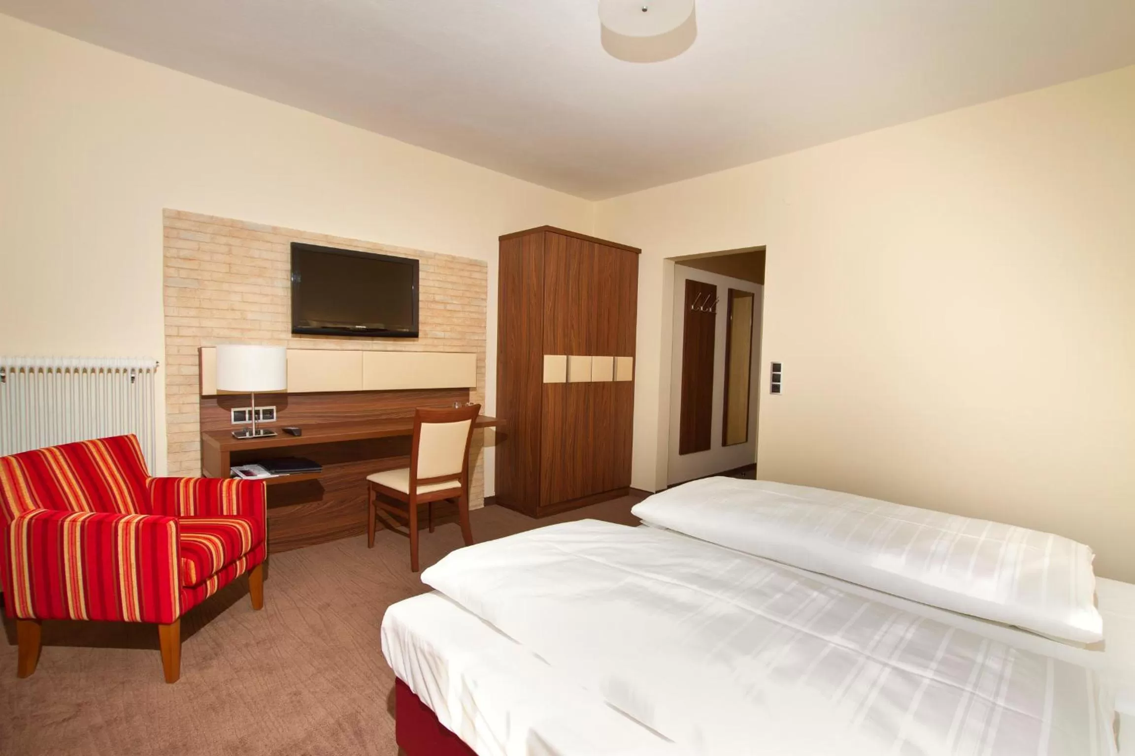 Bedroom in SCHÖNIS-Landhotel