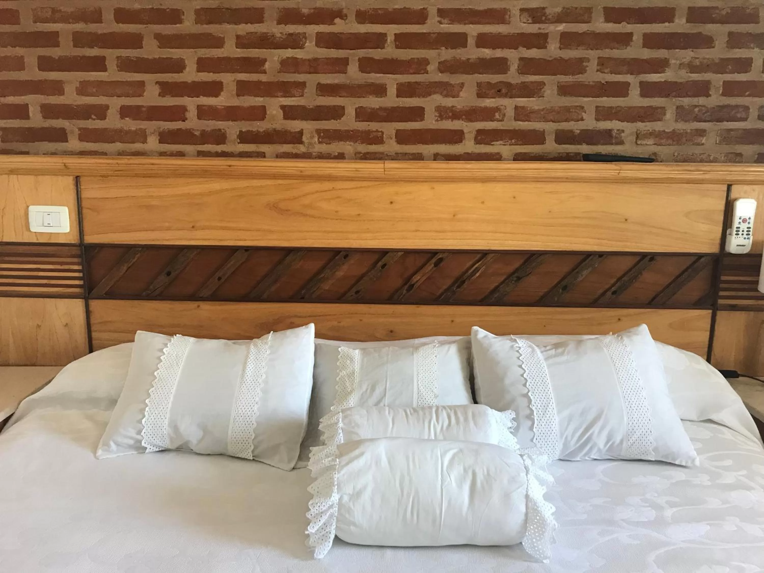 Bed in Costanera Mar Hotel & Suites