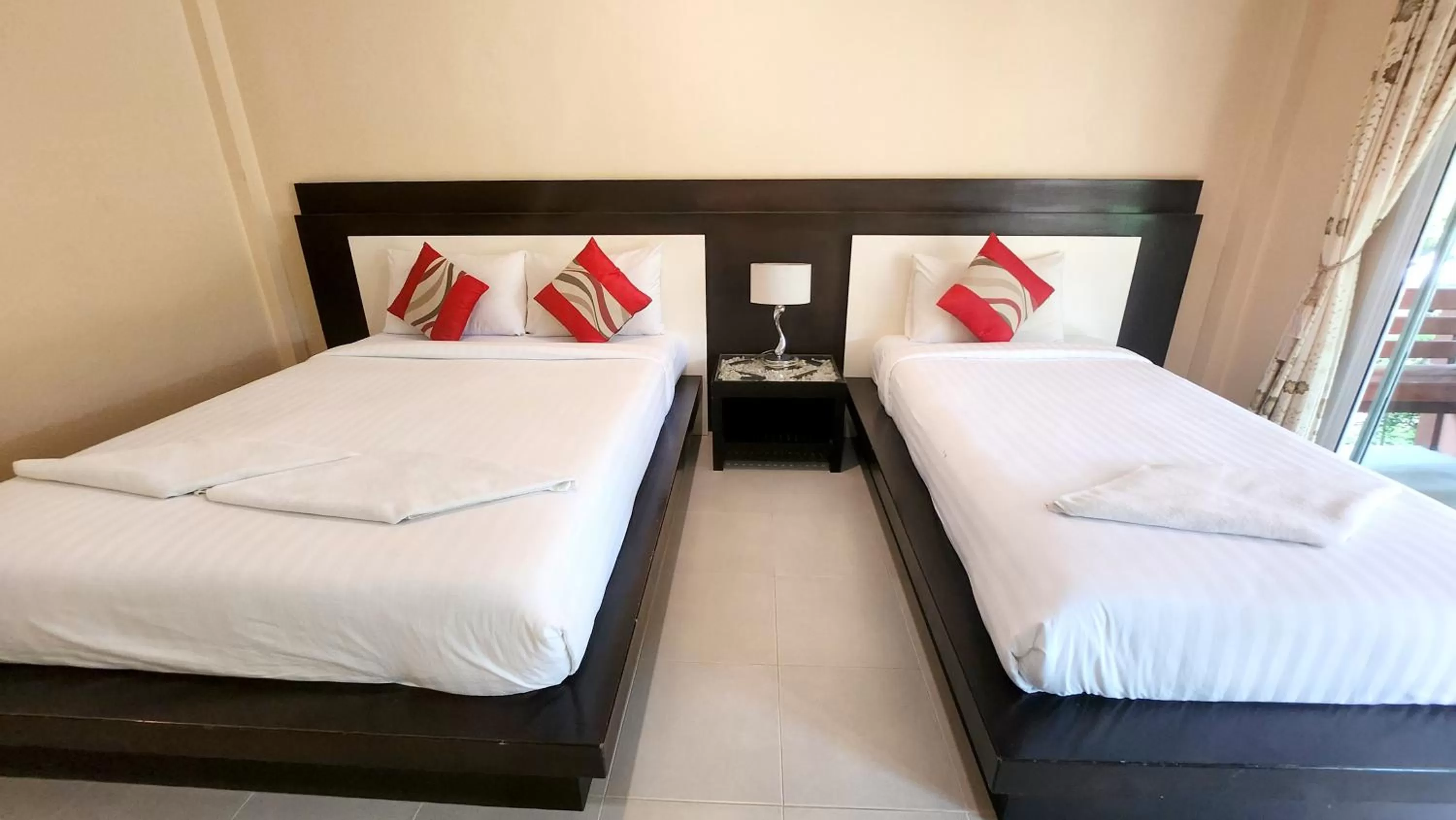 Bed in Sawaddee Aonang Resort