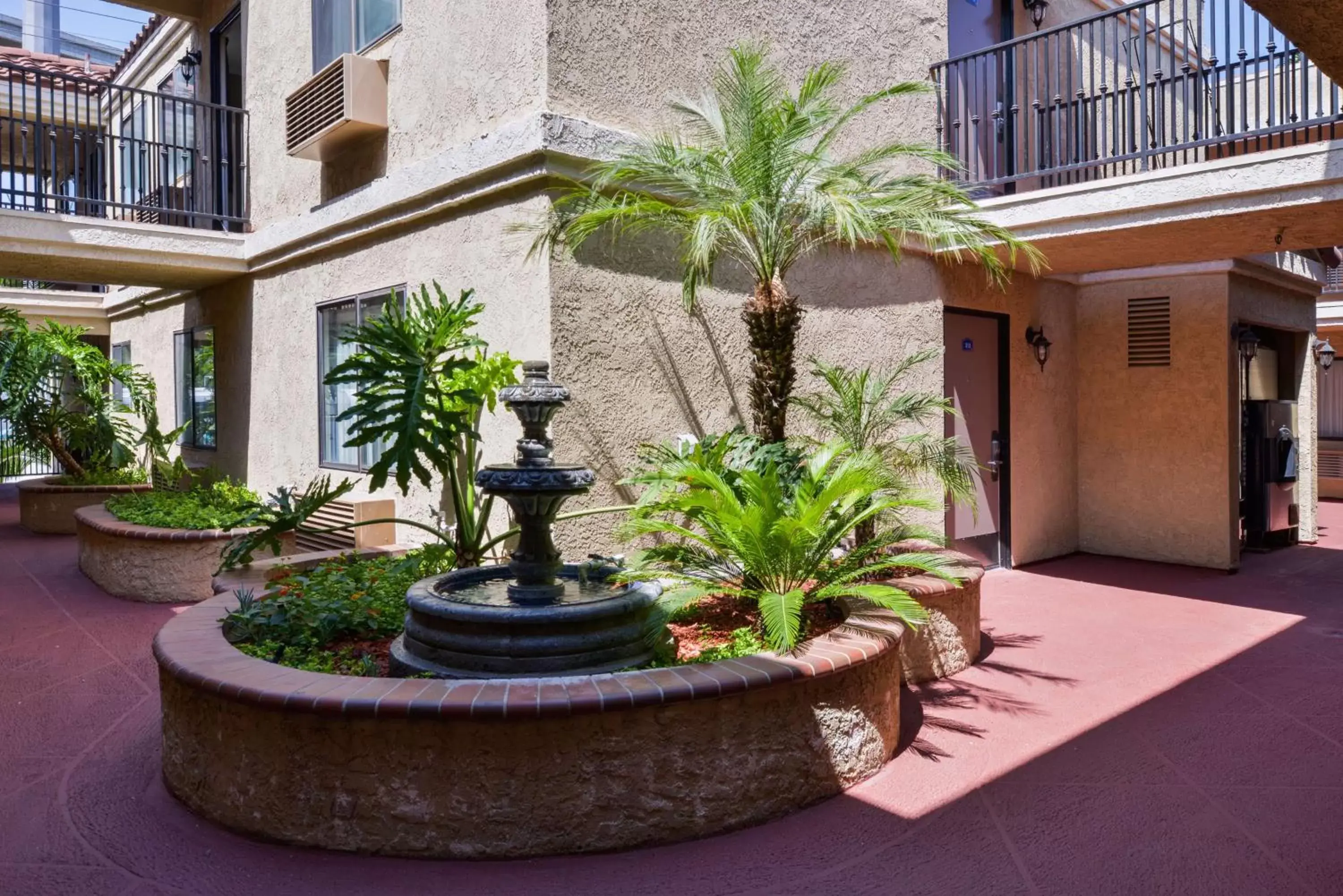 Patio, Property Building in Laguna Inn and Suites