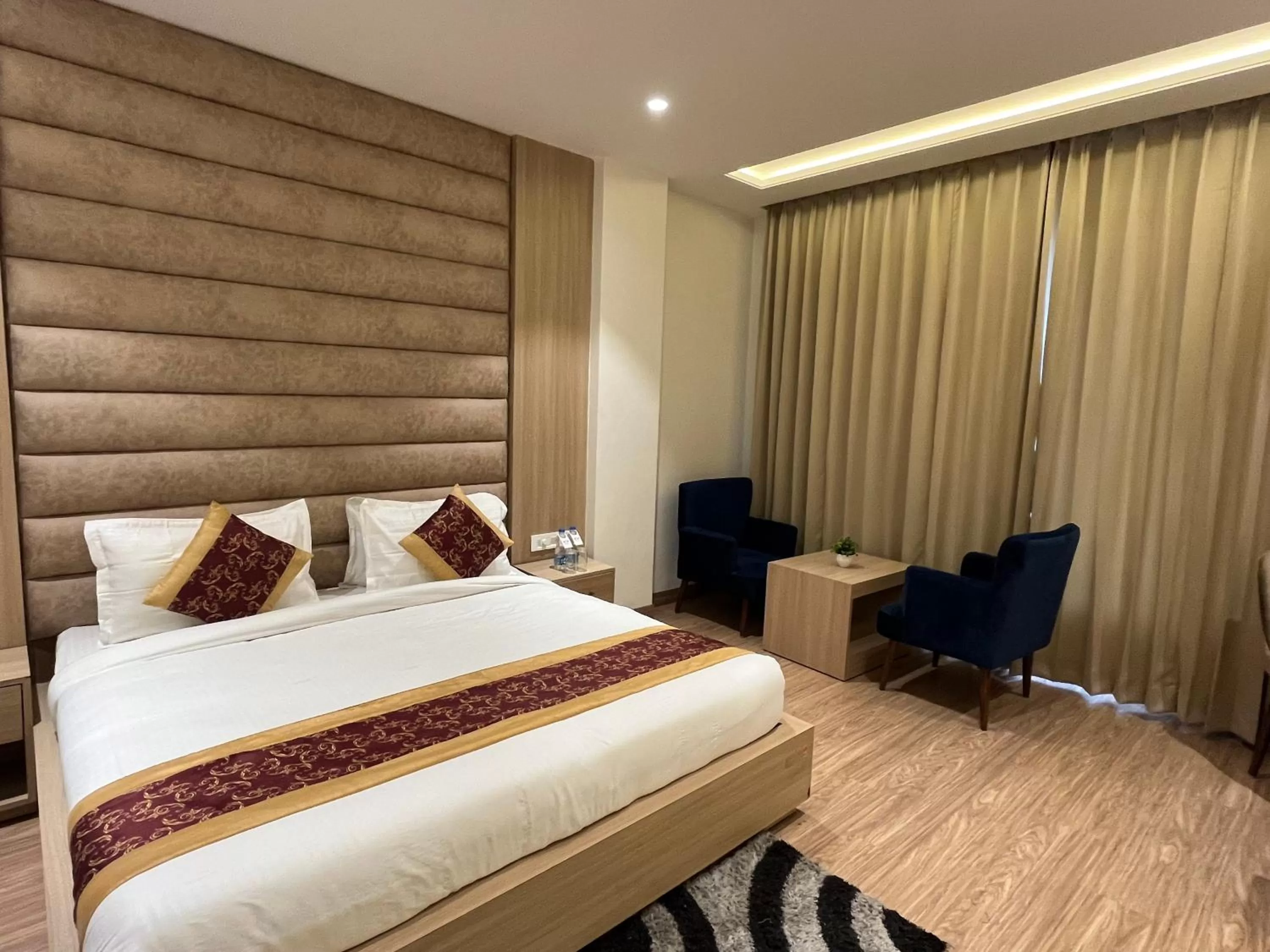 Photo of the whole room, Bed in RRV Hotel