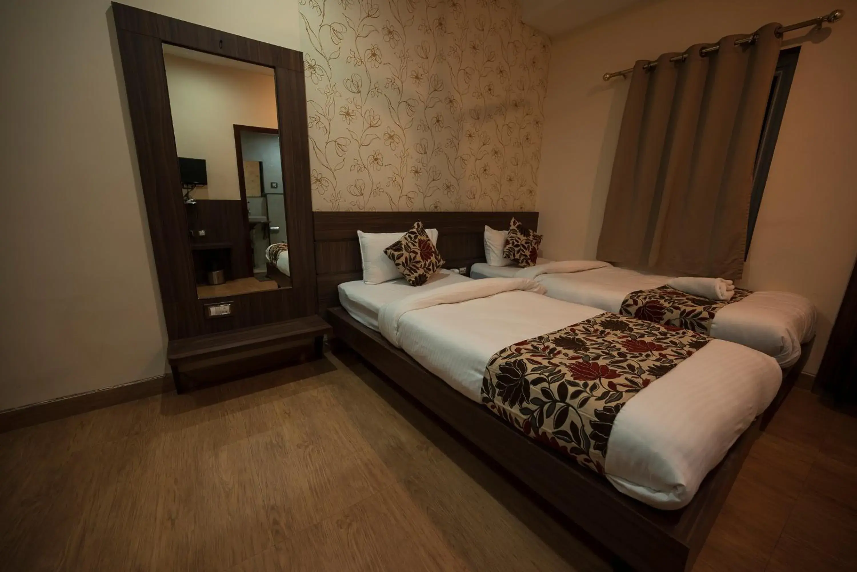 Bed in Rajdarbar Hotel & Banquets