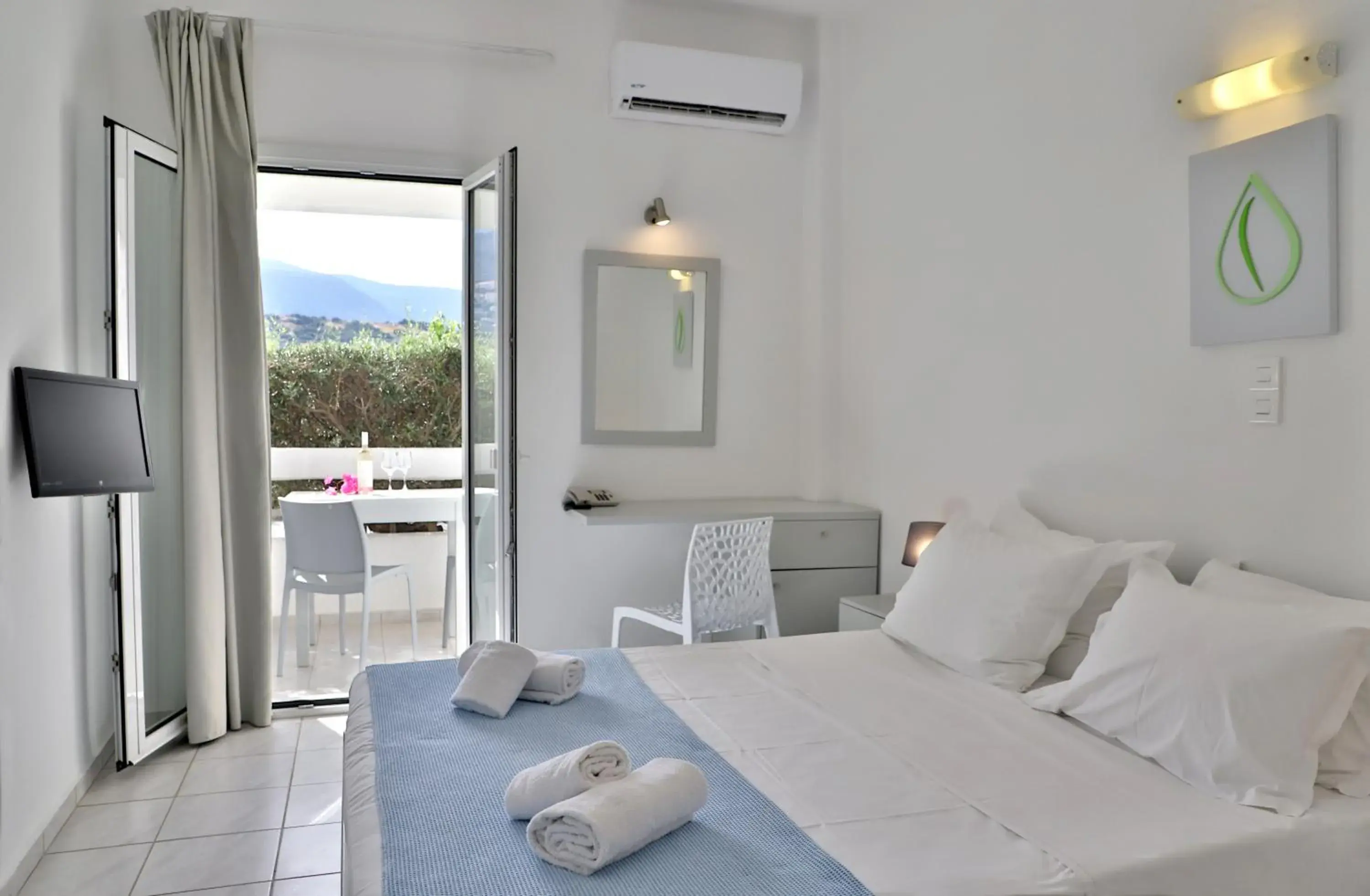 Photo of the whole room, Bed in Elounda Krini Hotel
