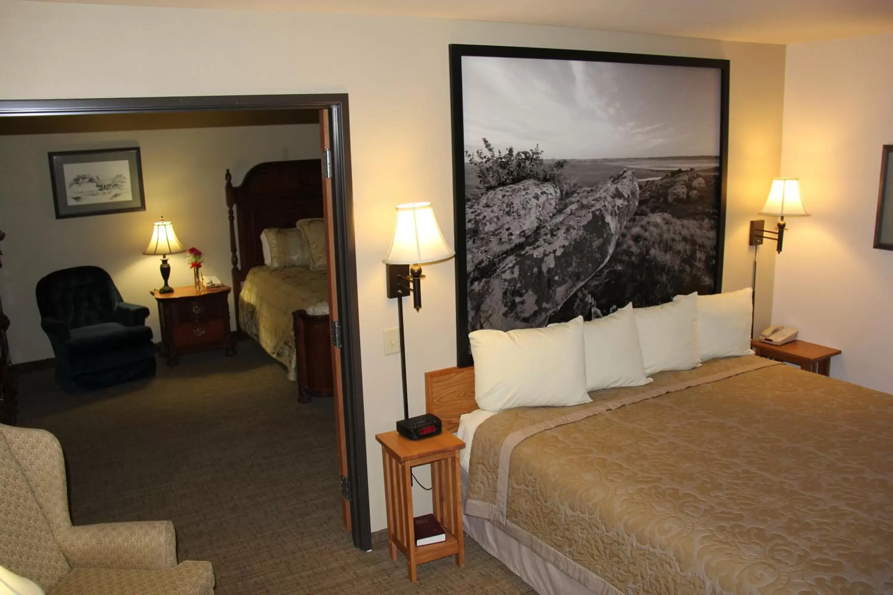 Bedroom, Bed in Homestead Inn and Suites