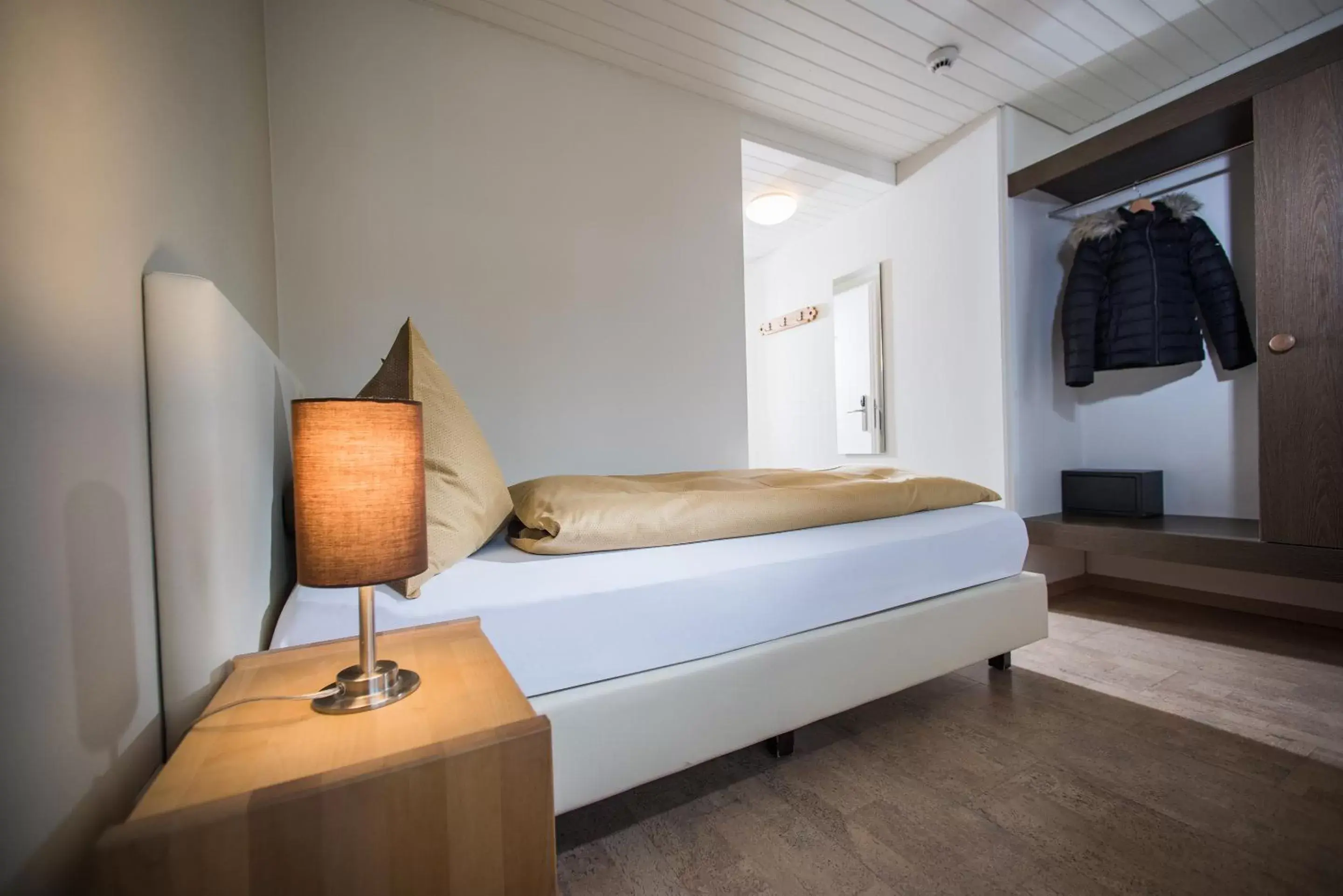 Bed in Jungfrau Hotel
