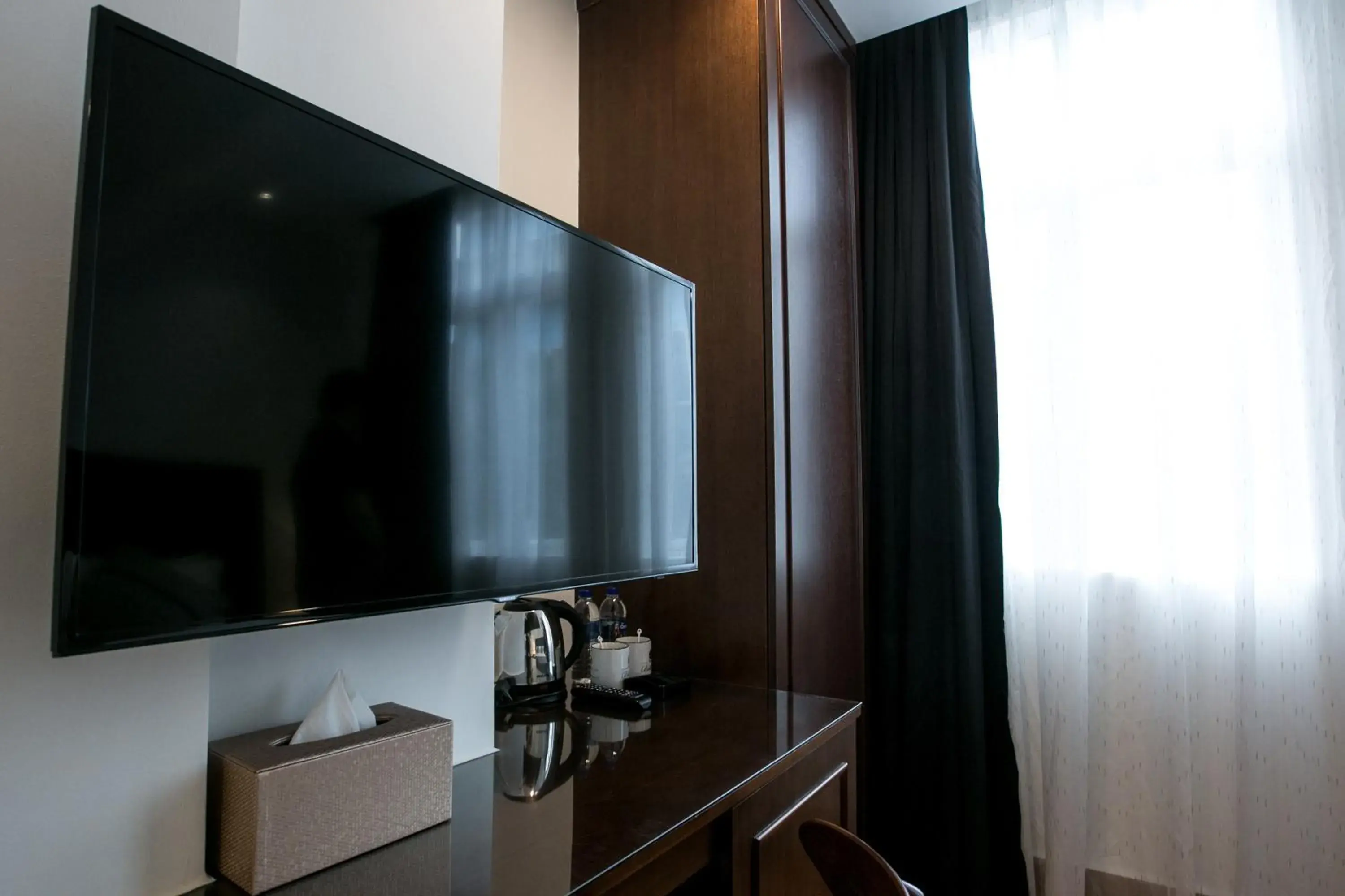 TV and multimedia in Belllo Hotel JB Central TV and multimedia in Belllo Hotel JB Central