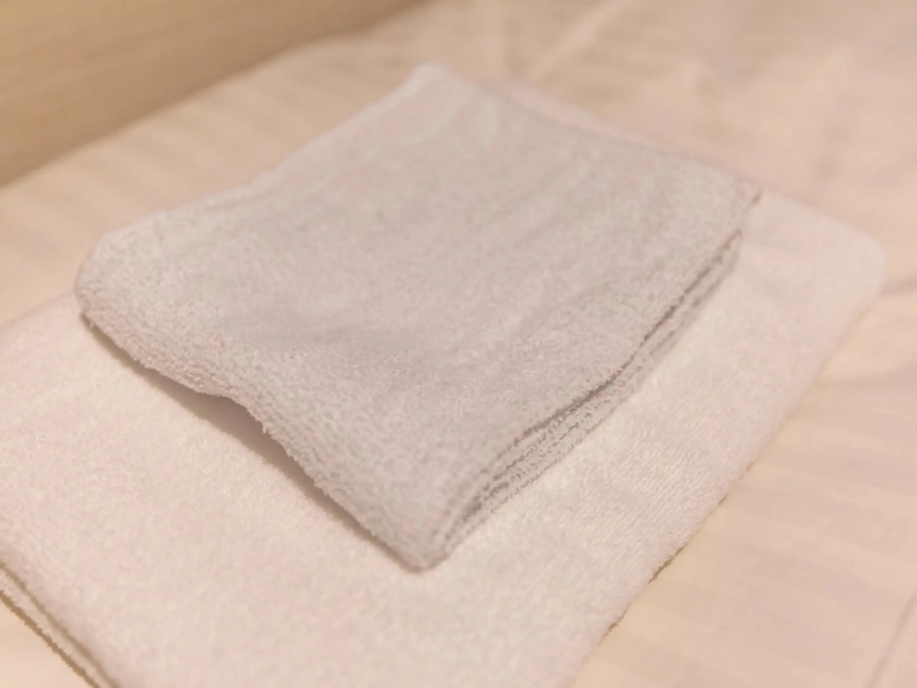 towels, Bed in Tabist Hotel Smart Sleeps Oita Station