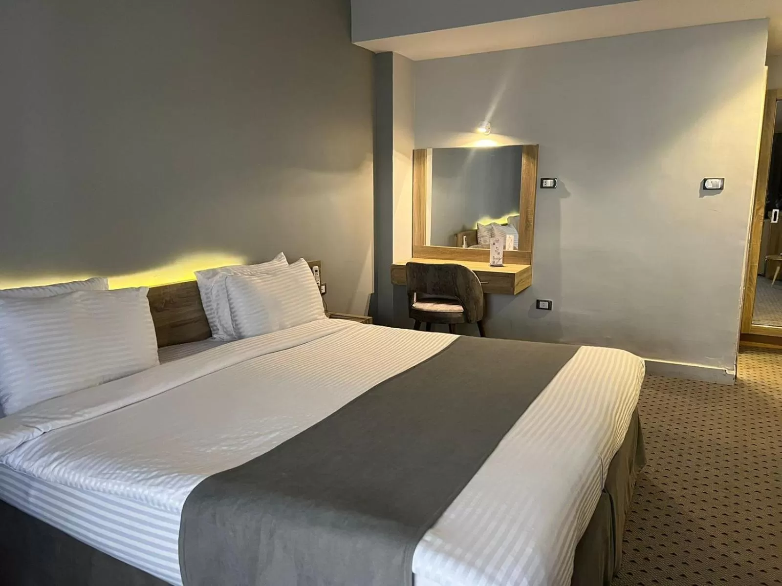 Bed in Atlas International Hotels