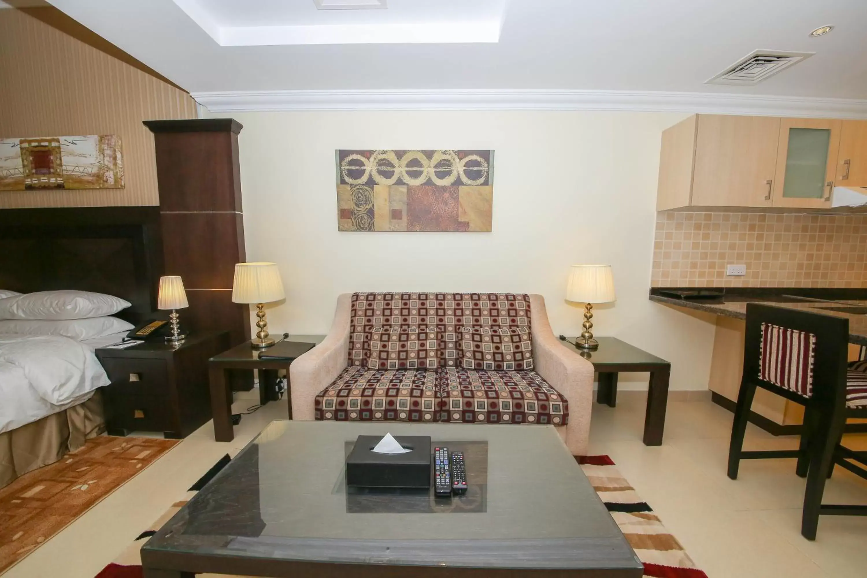 Living room, Bed in Ivory Grand Hotel Apartments