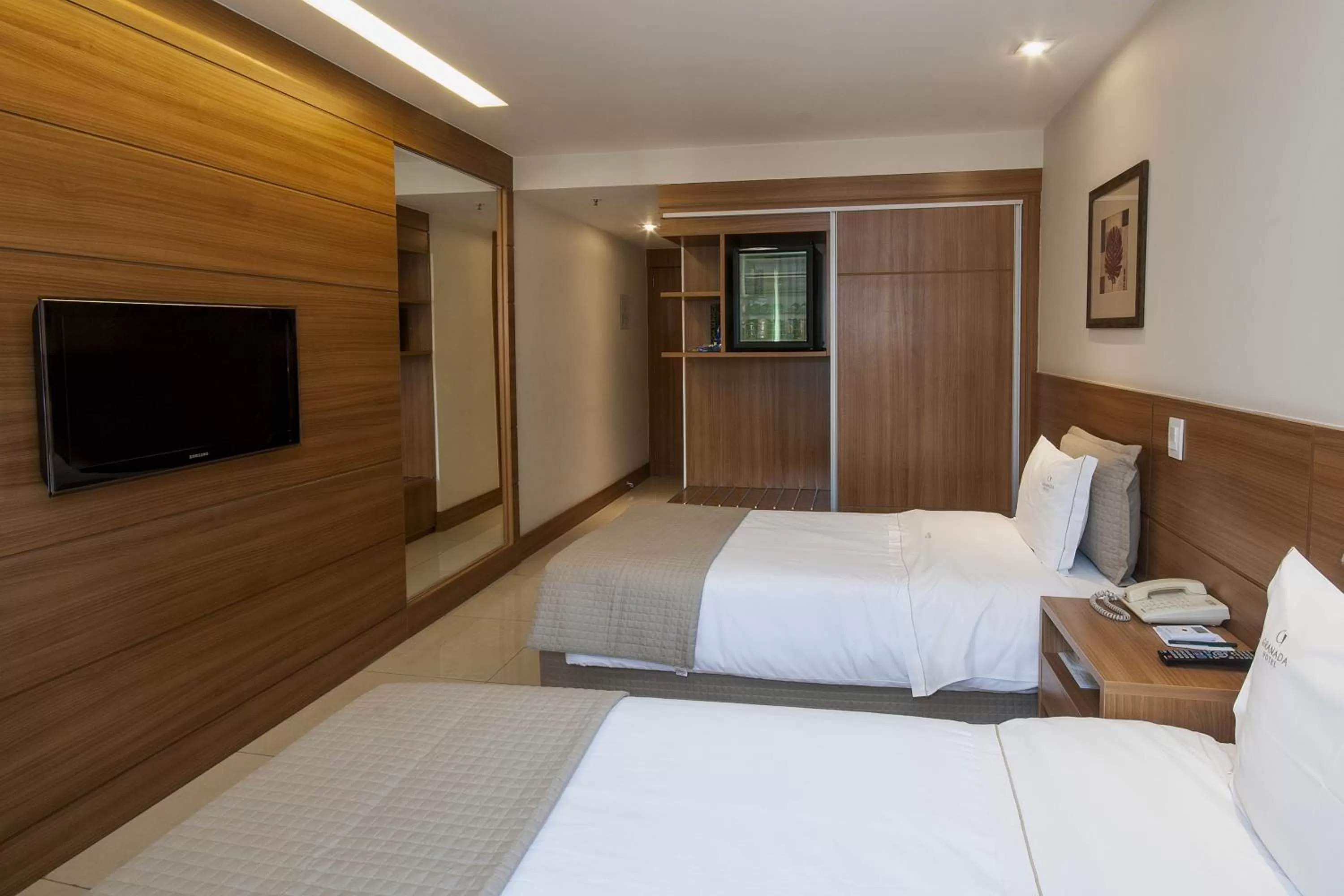 Bed in Américas Granada Hotel