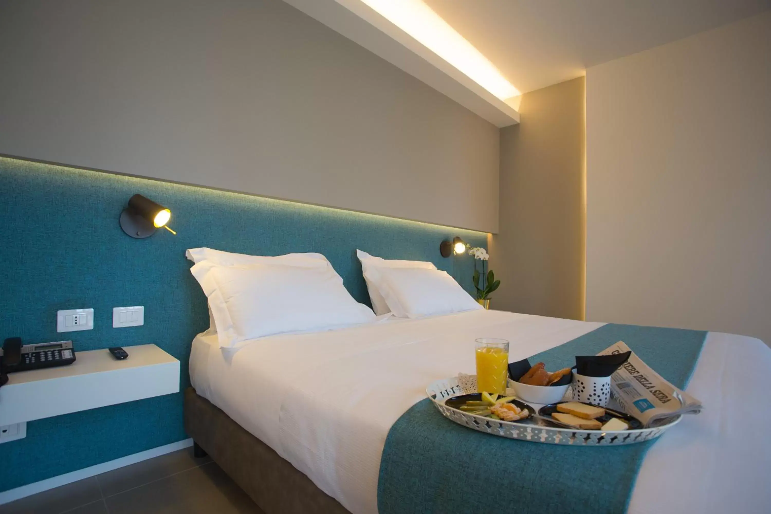 Bed in Airone City Hotel