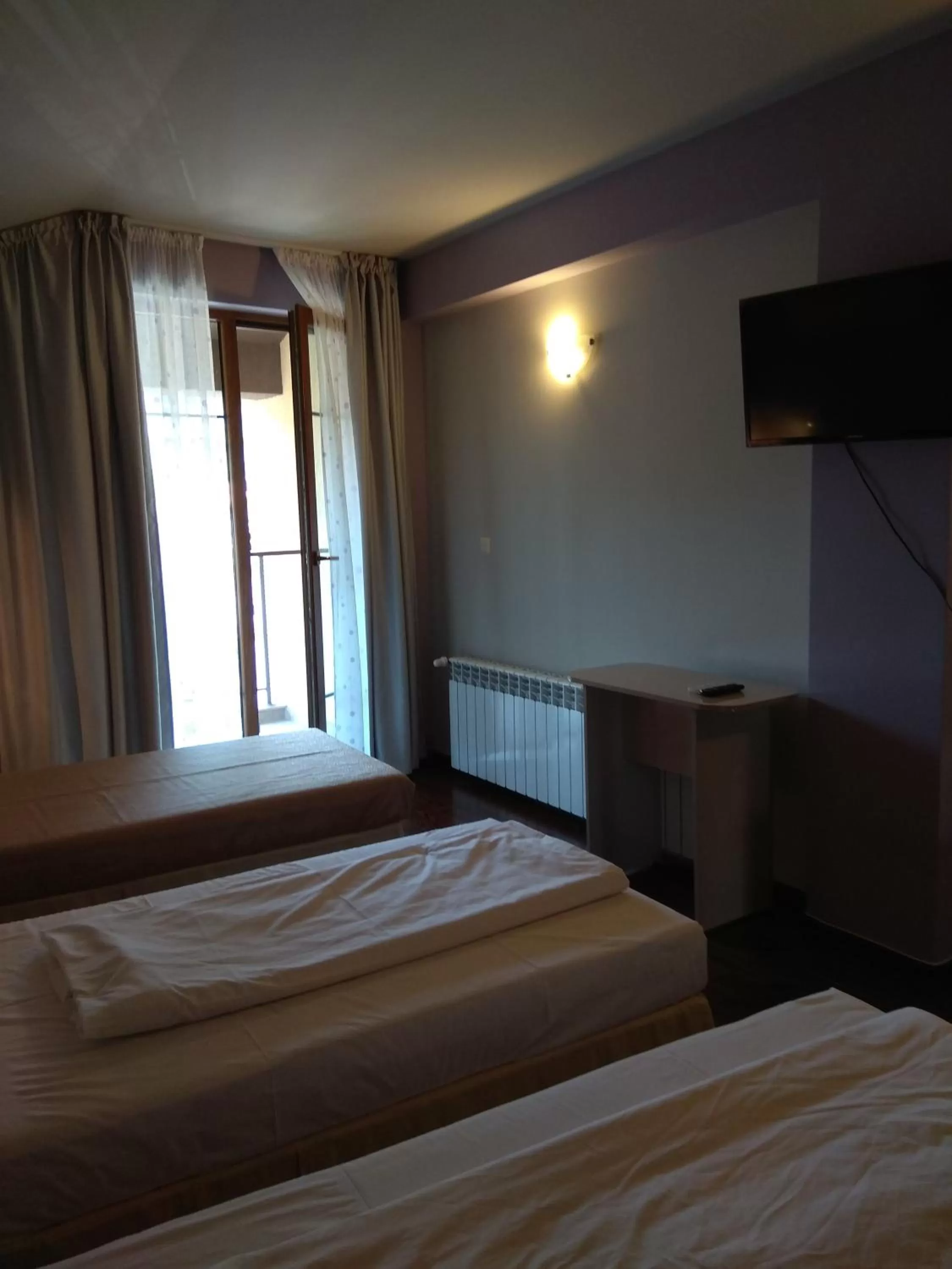 Bed in Roots Hotel and Wine Bar