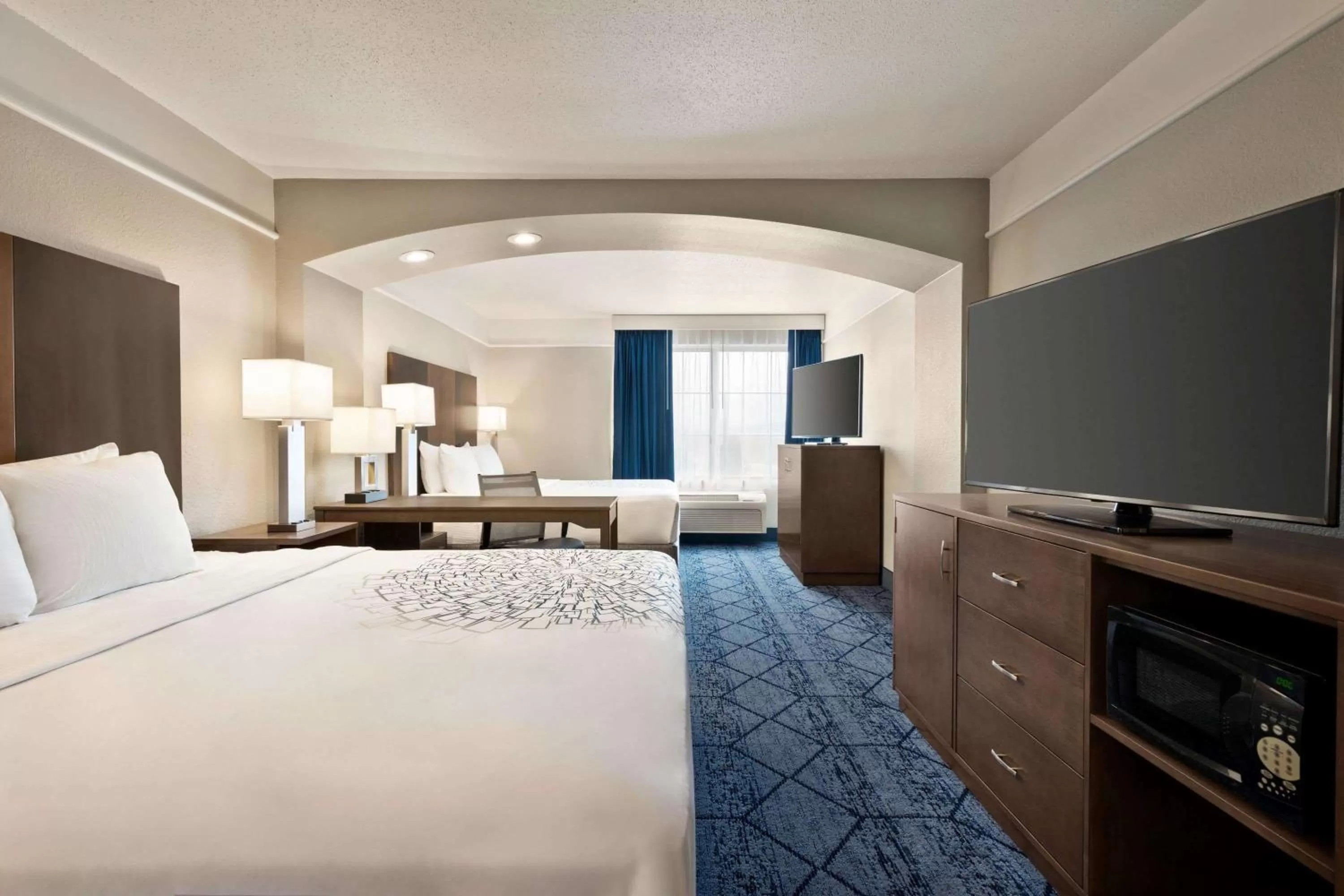 Photo of the whole room, Bed in La Quinta Inn and Suites by Wyndham at WaTiki Waterpark