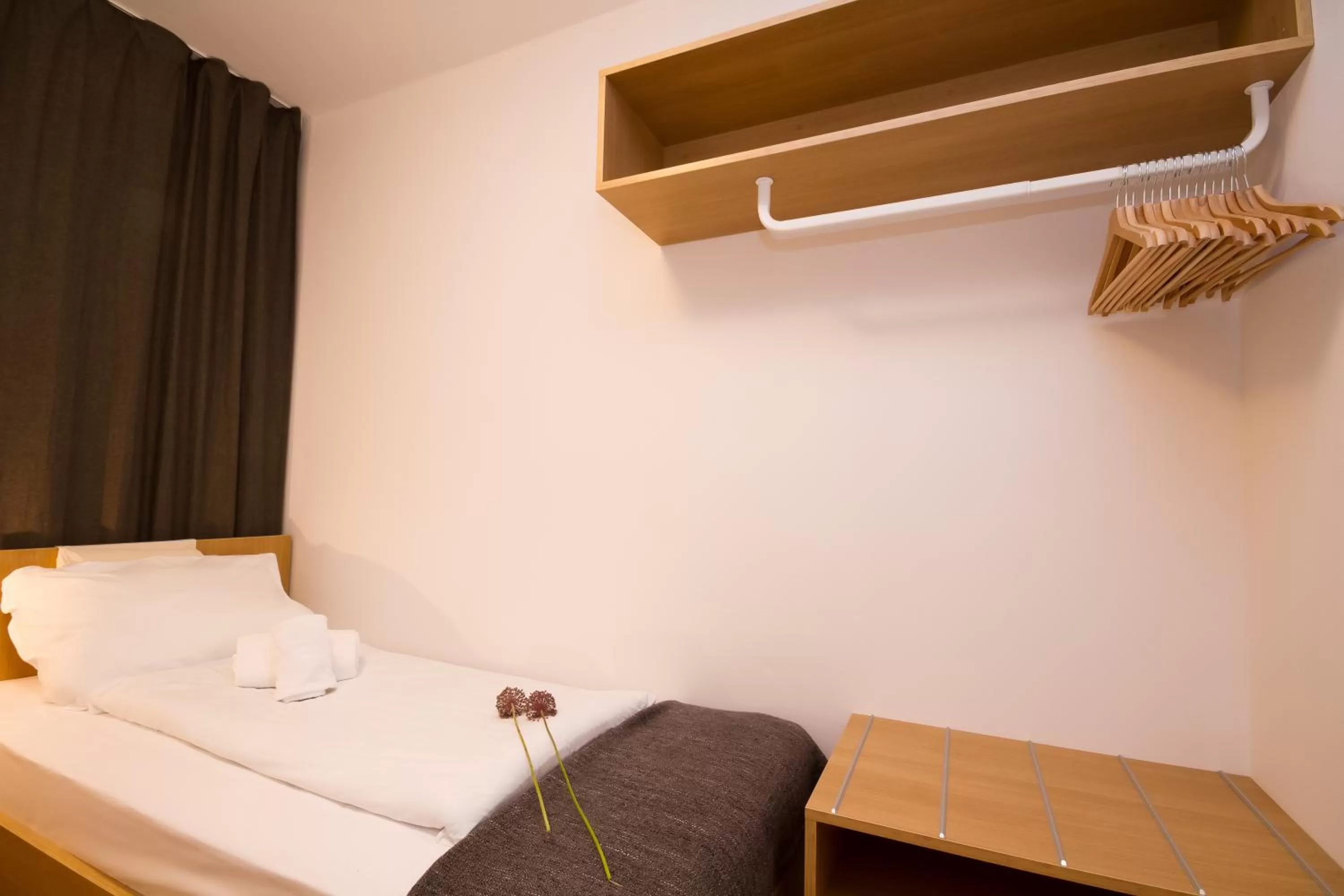 Bed in Forgotten Garden Apartments Portoroz