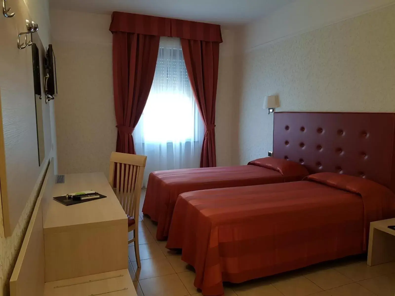 Bed in Hotel Villa Rosa
