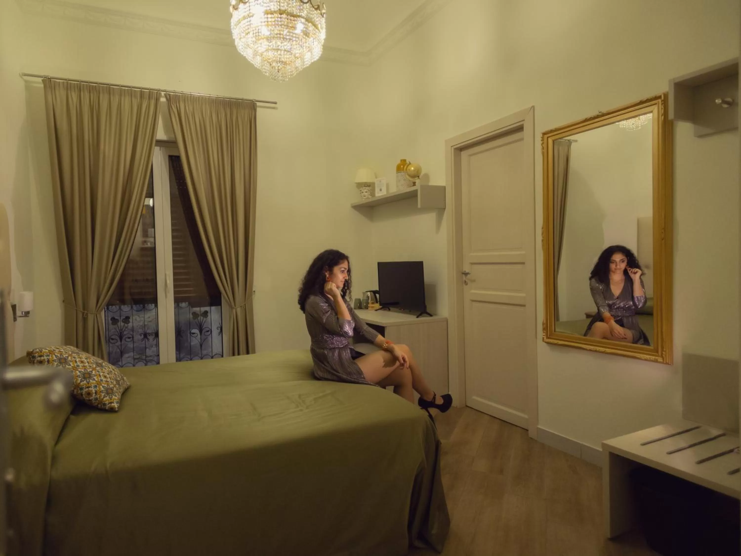 Bed in Kèramos Luxury Rooms