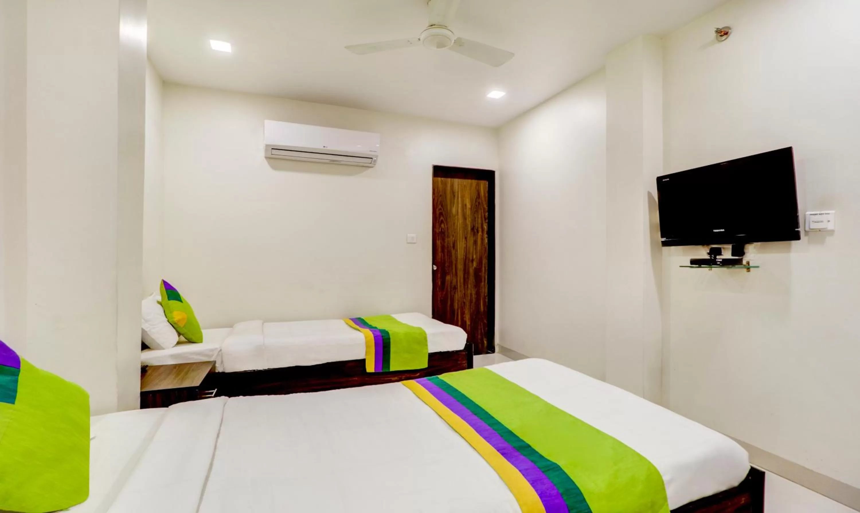 Bed in Treebo Trend Orange City