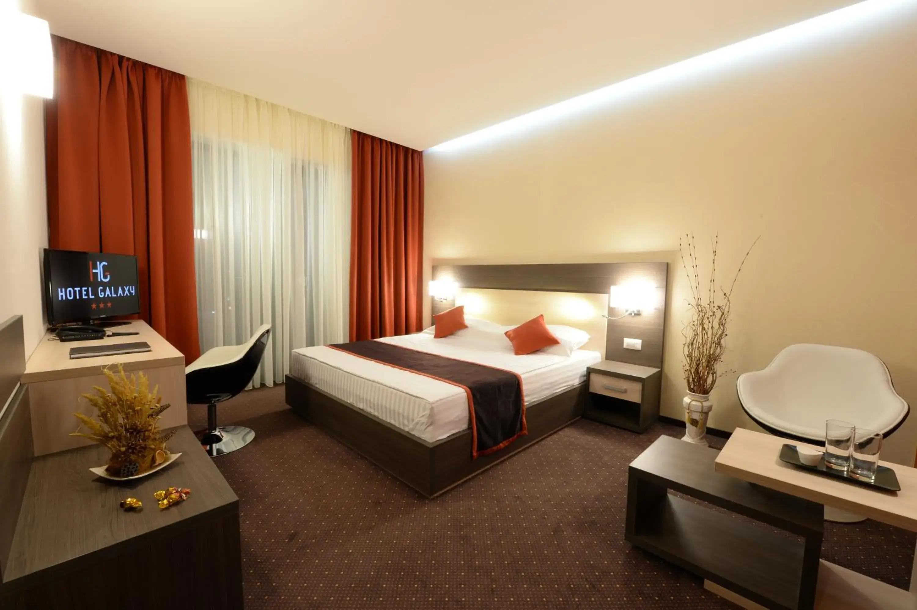 Photo of the whole room, Bed in Hotel Galaxy Photo of the whole room, Bed in Hotel Galaxy