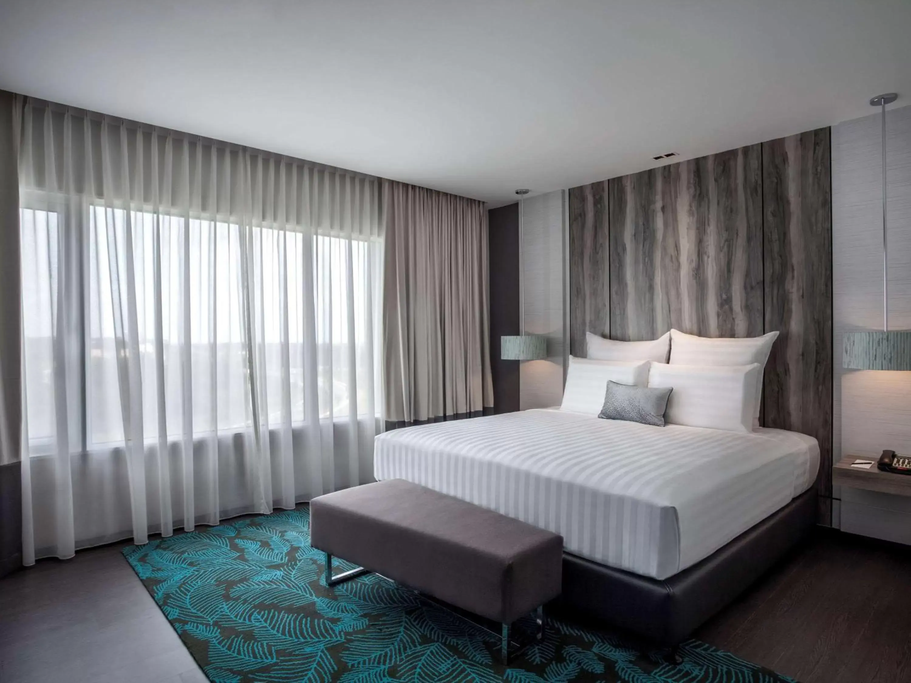 Photo of the whole room, Bed in Pullman Miri Waterfront