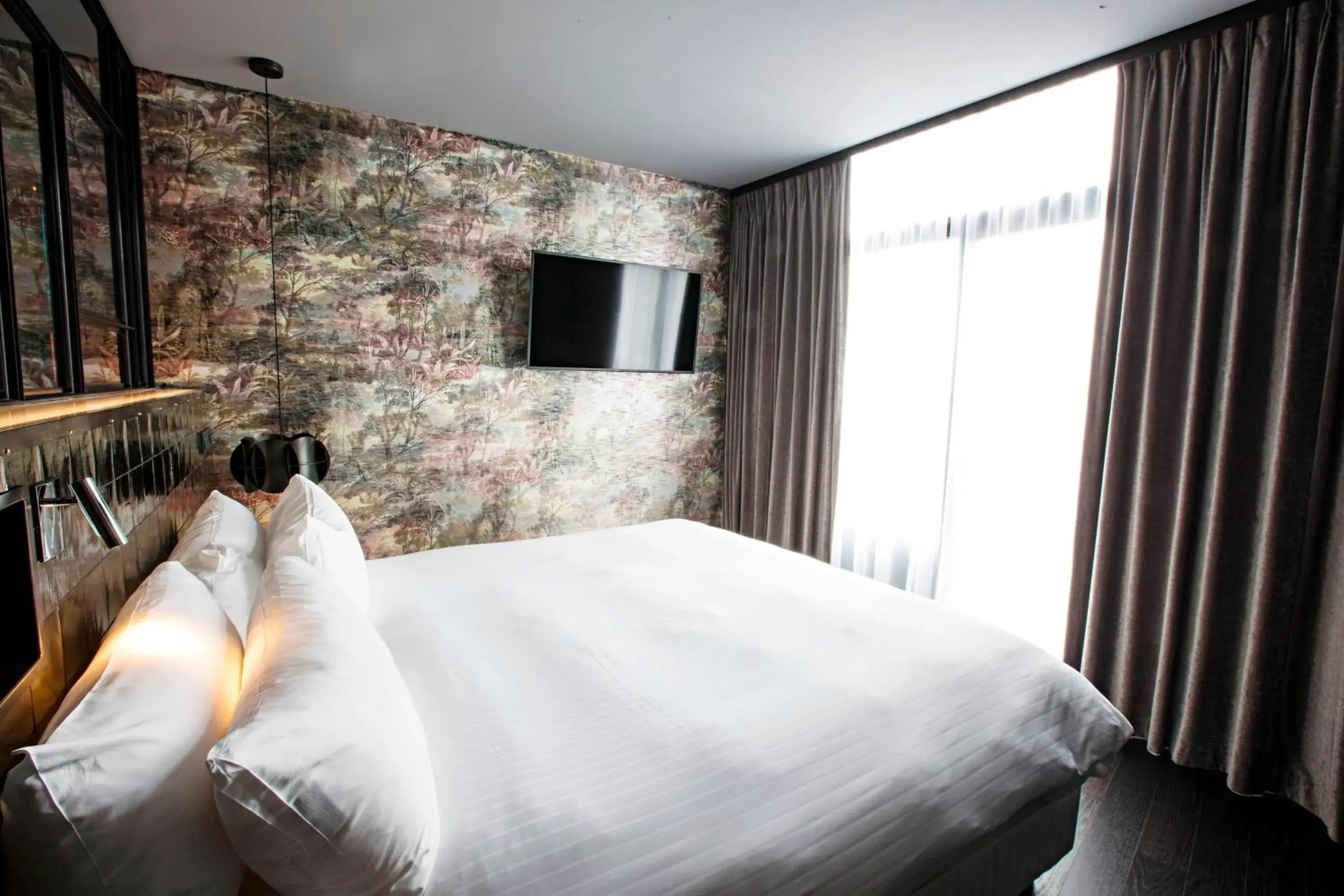 Bedroom in Apollo Hotel Amsterdam, a Tribute Portfolio Hotel