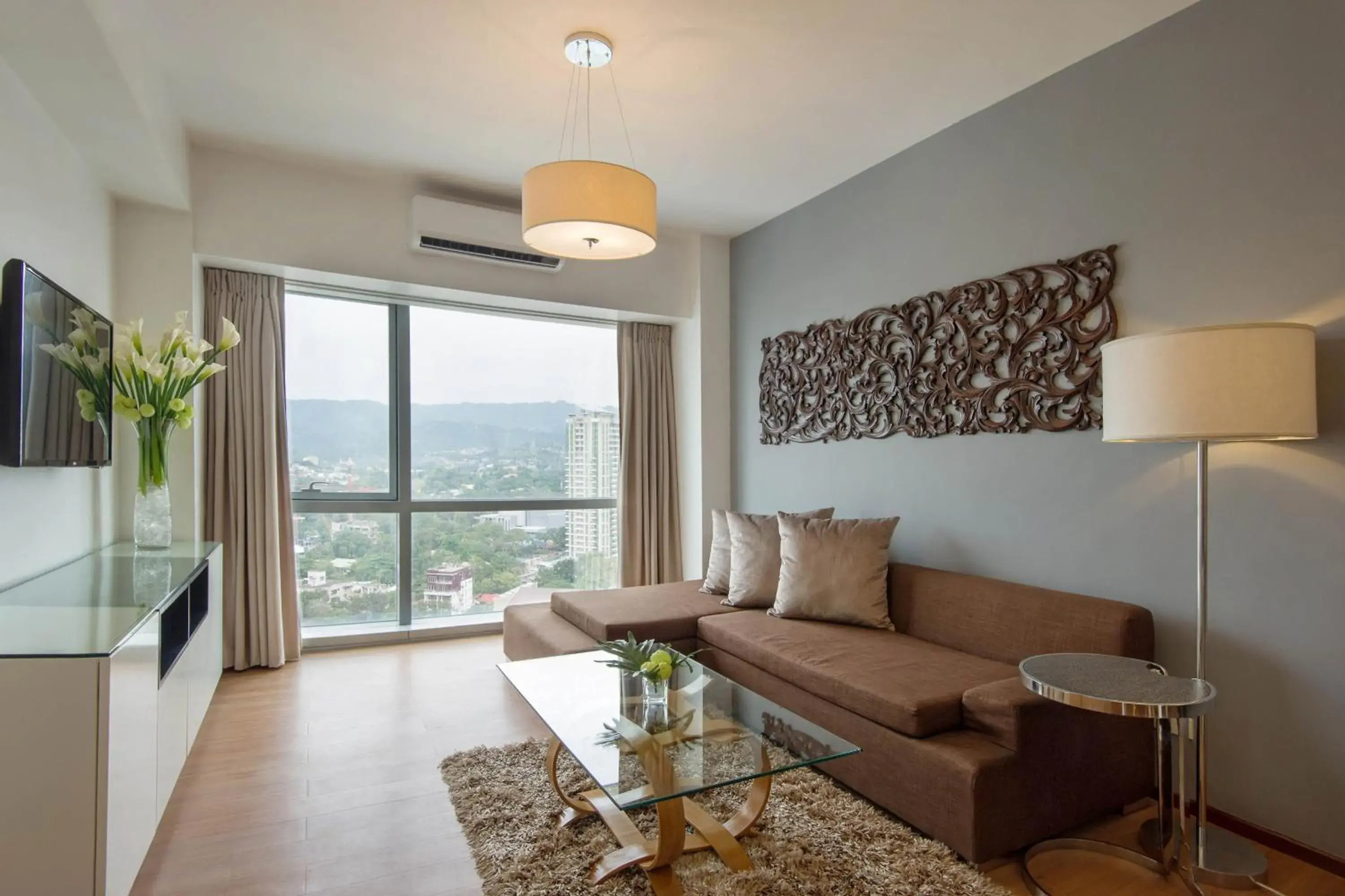 Communal lounge/ TV room, Seating Area in Quest Serviced Residences