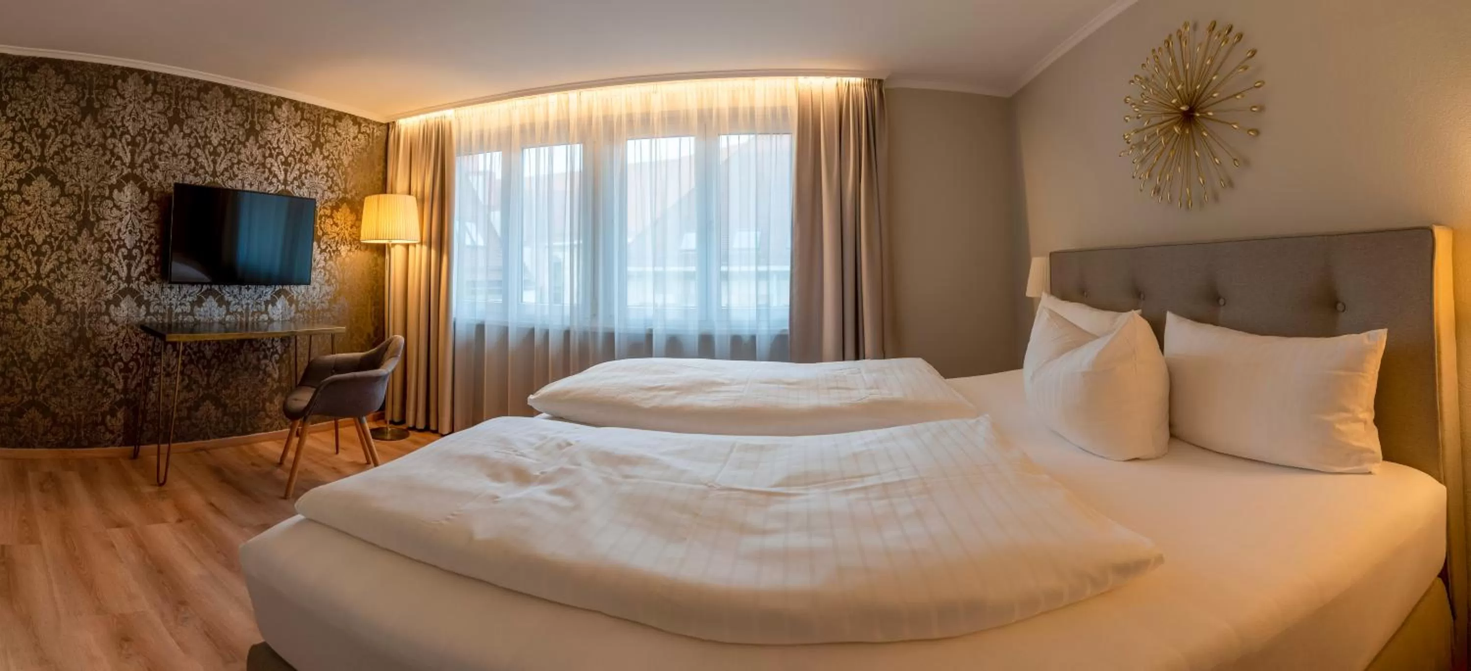 Bed in Hotel Rappen am Münsterplatz