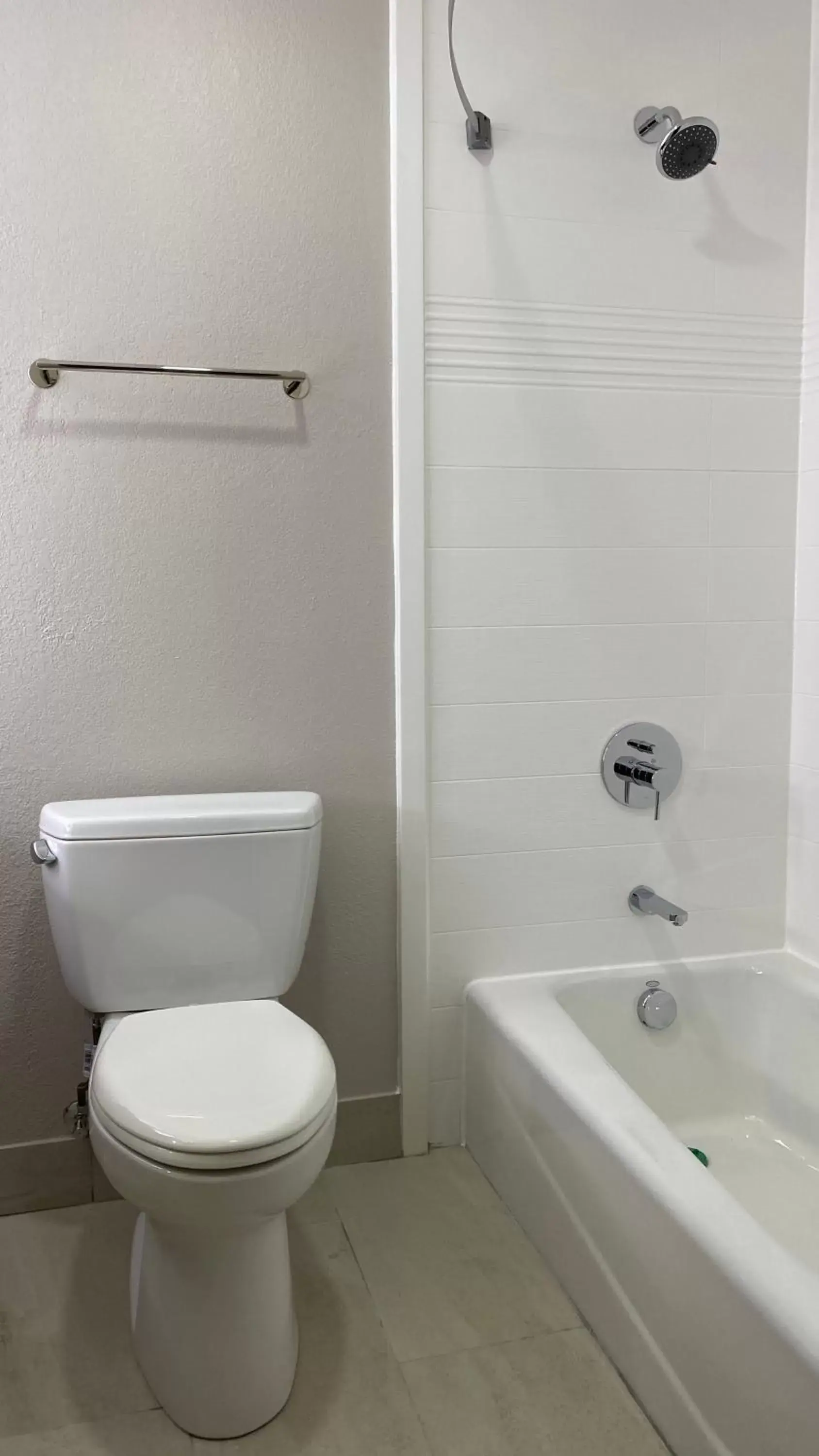 Toilet, Bathroom in Days Inn & Suites by Wyndham Peachtree Corners Norcross