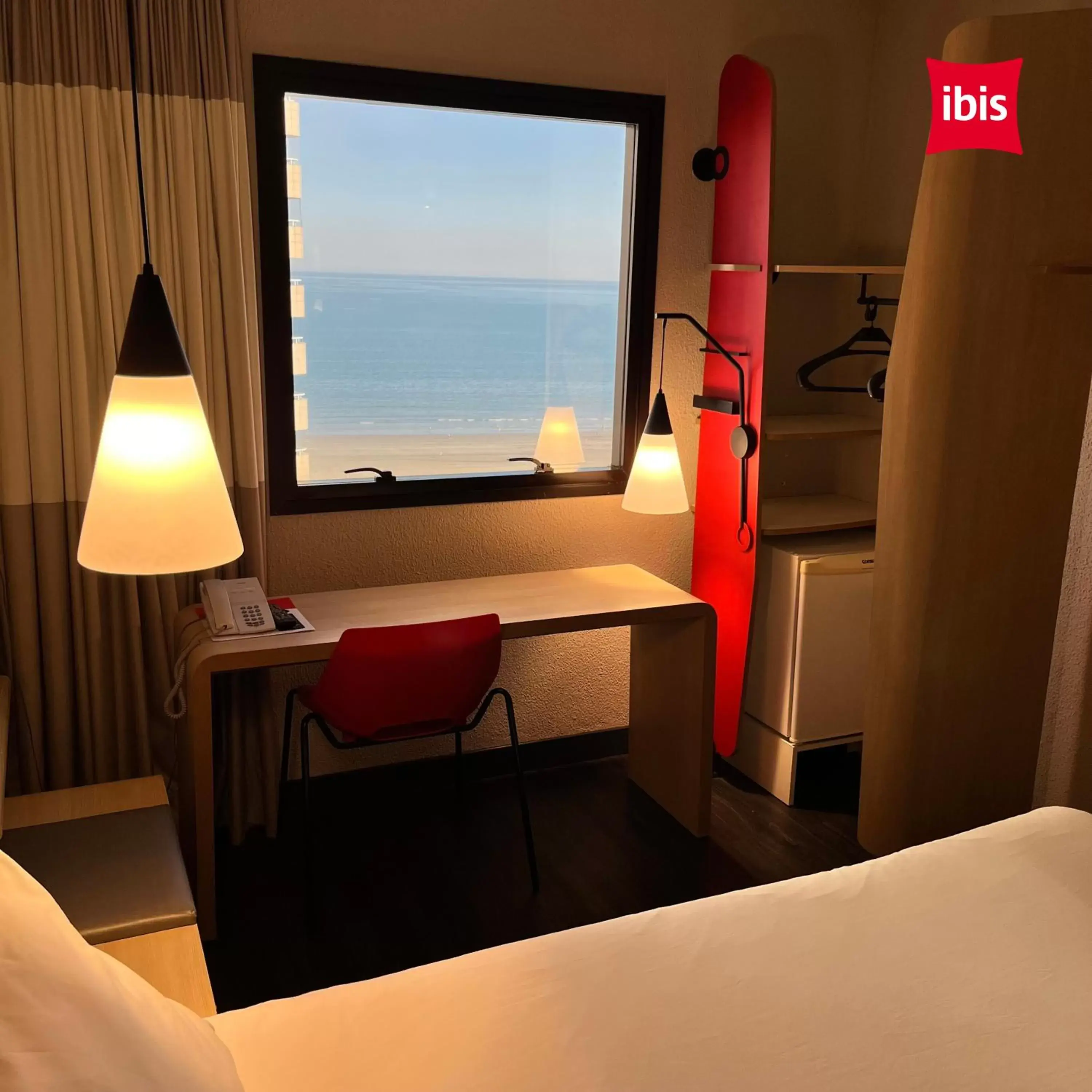 View (from property/room), Bed in ibis Santos Gonzaga Praia