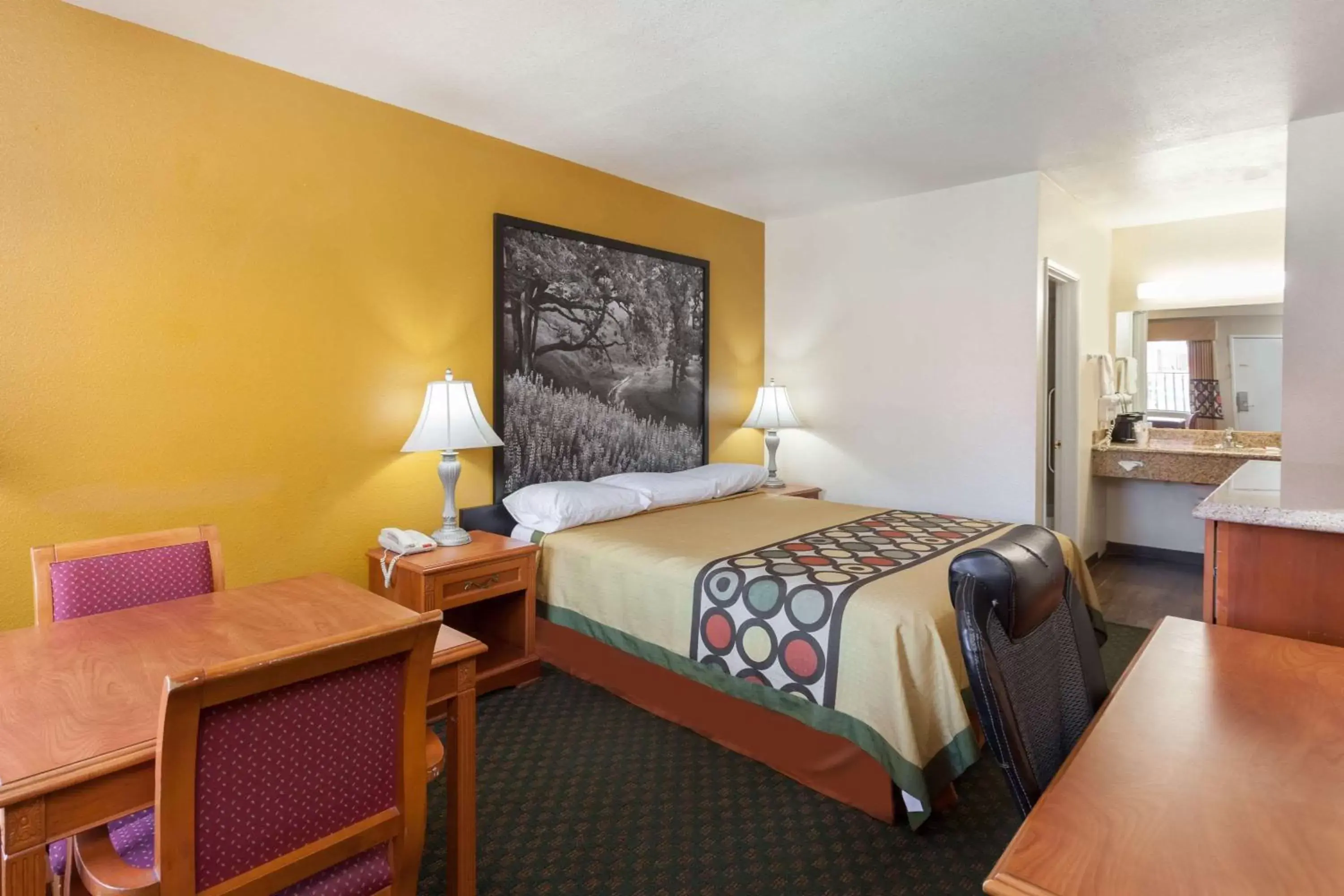 Photo of the whole room, Bed in Super 8 by Wyndham Bakersfield South CA